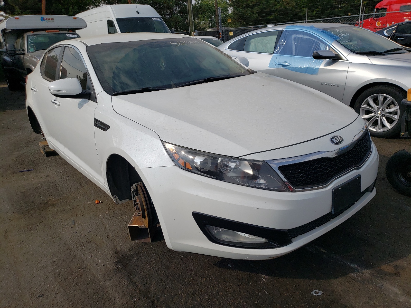 KIA OPTIMA LX 2013 with VIN 5XXGM4A74DG223474 - Photo from auction