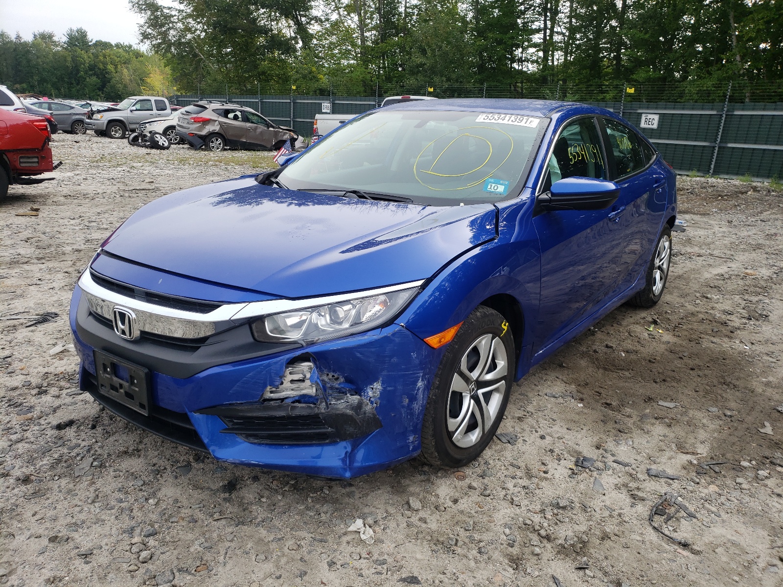 Photo 2 from auction – 2018 HONDA CIVIC LX with VIN 19XFC2F57JE029620