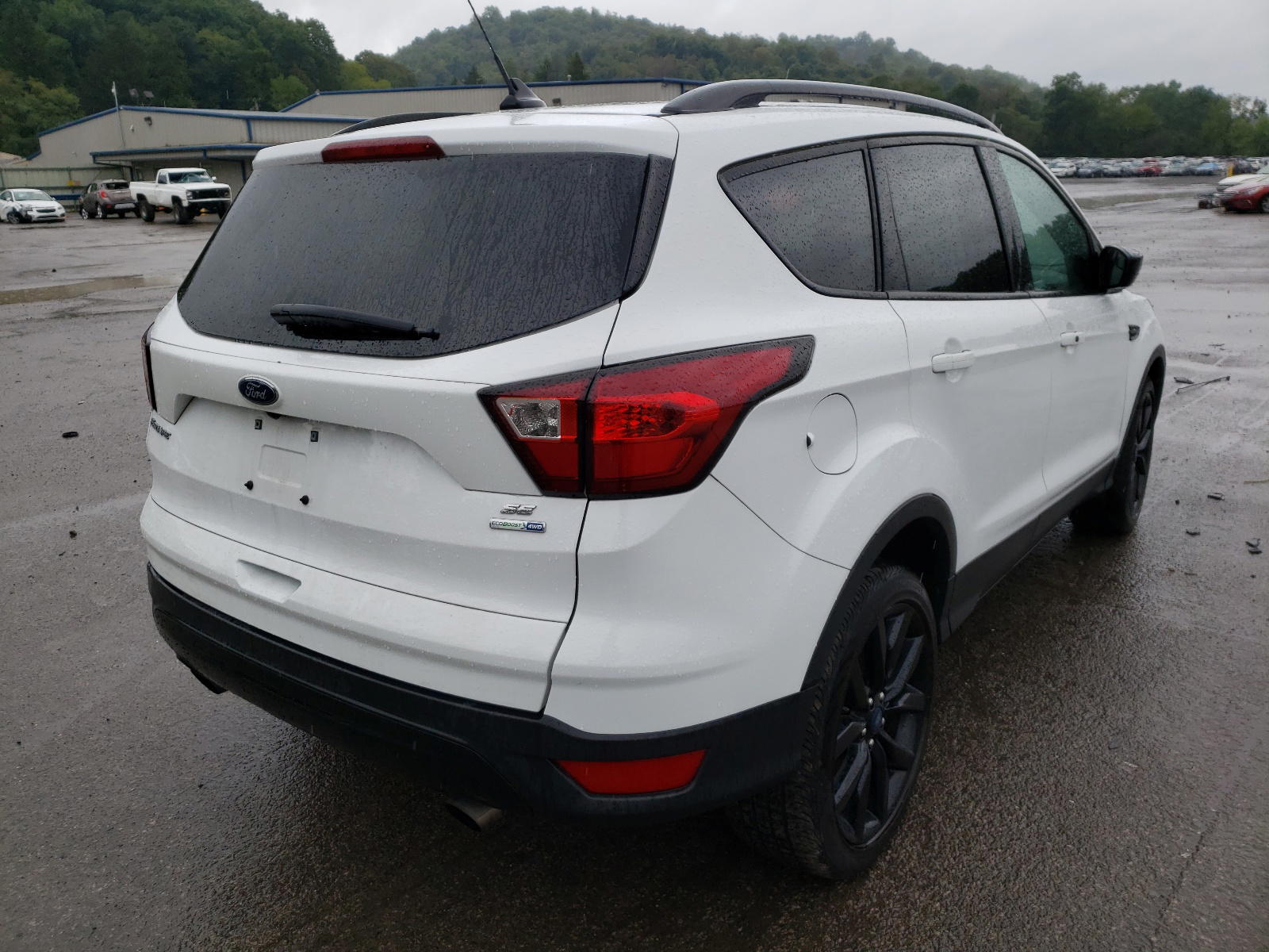 Photo 4 from auction – 2019 FORD ESCAPE SE with VIN 1FMCU9GD2KUB76103