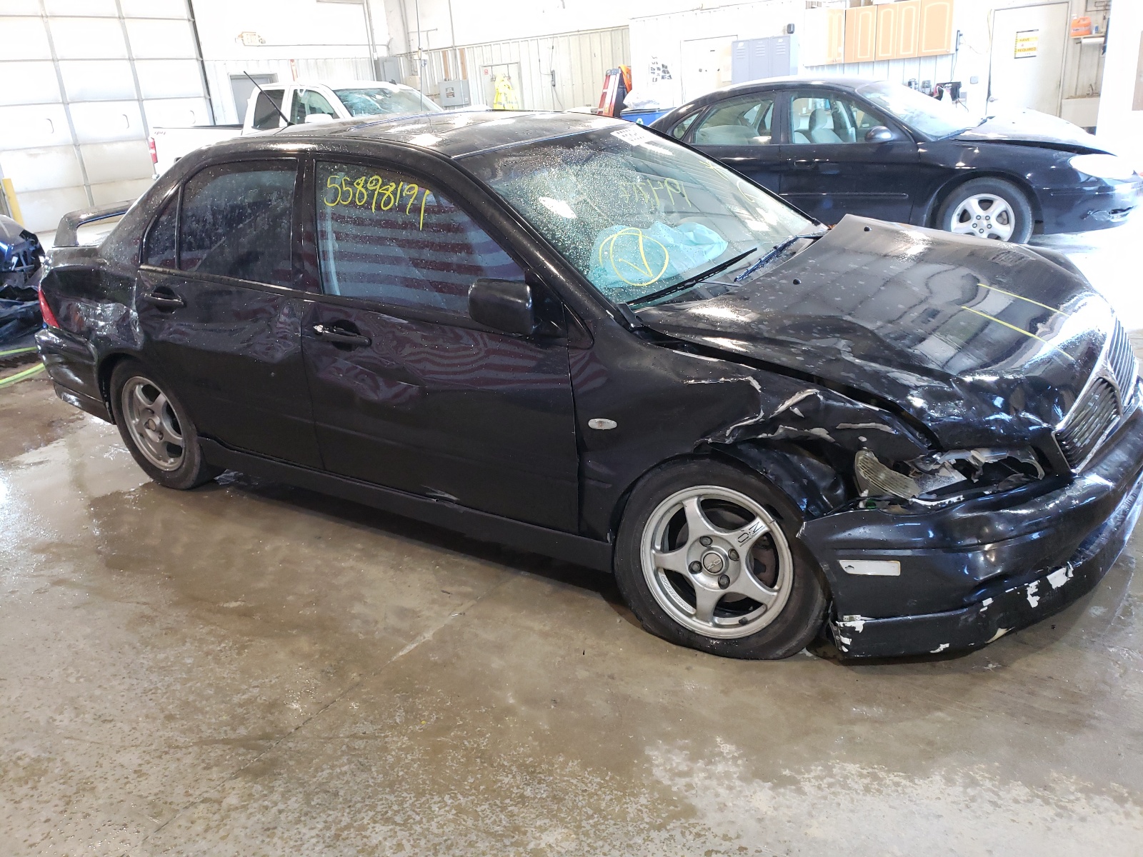 Photo 9 from auction – 2003 MITSUBISHI LANCER OZ with VIN JA3AJ86E43U013994