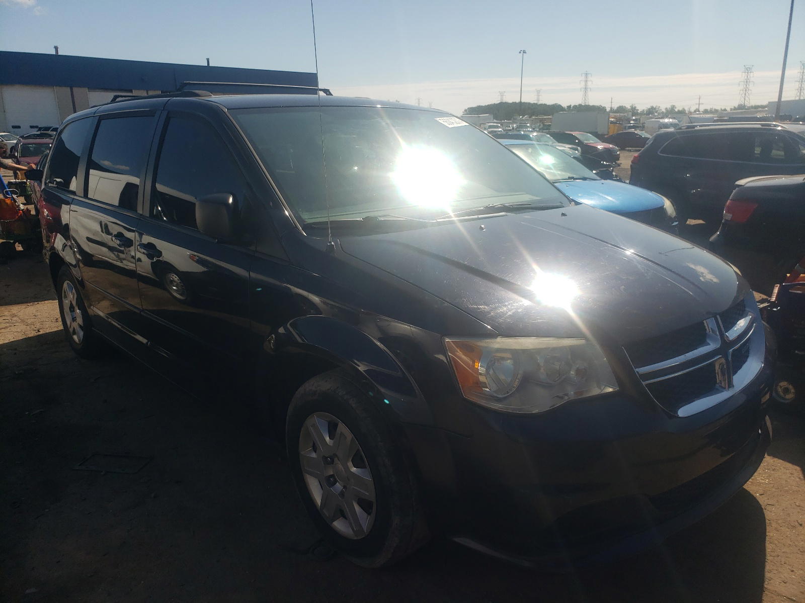 DODGE GRAND CARA 2011 with VIN 2D4RN4DG2BR730477 - Photo from auction