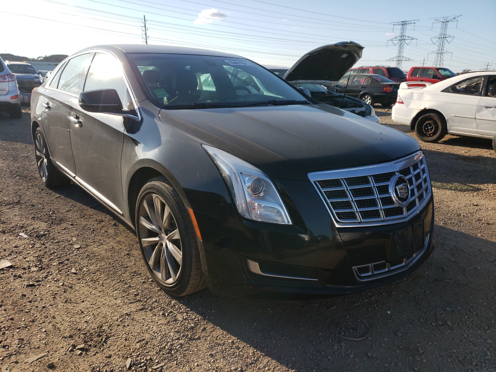 CADILLAC 62 2013 with VIN 2G61N5S34D9236515 - Photo from auction