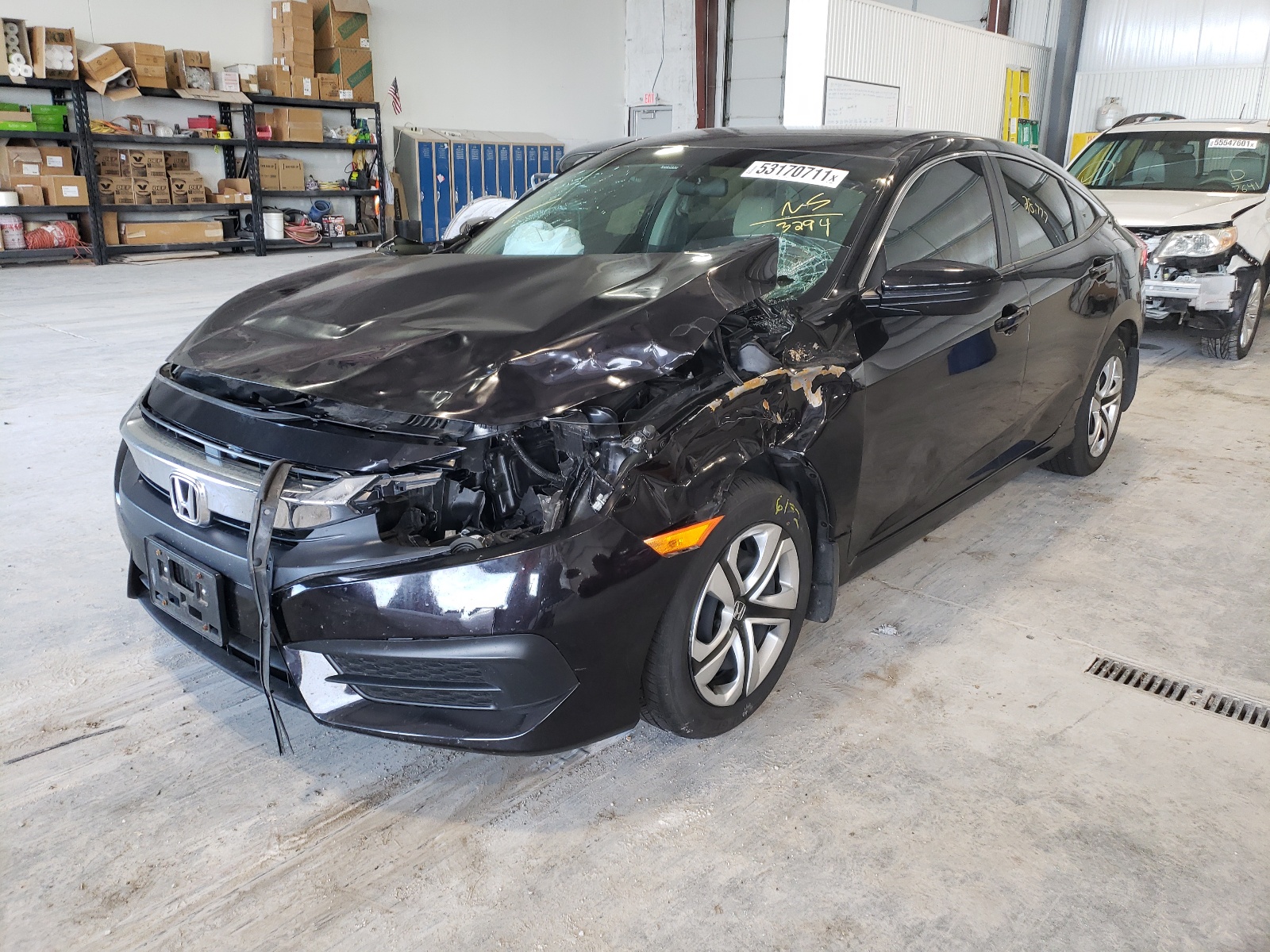 Photo 2 from auction – 2018 HONDA CIVIC LX with VIN 2HGFC2F53JH573294