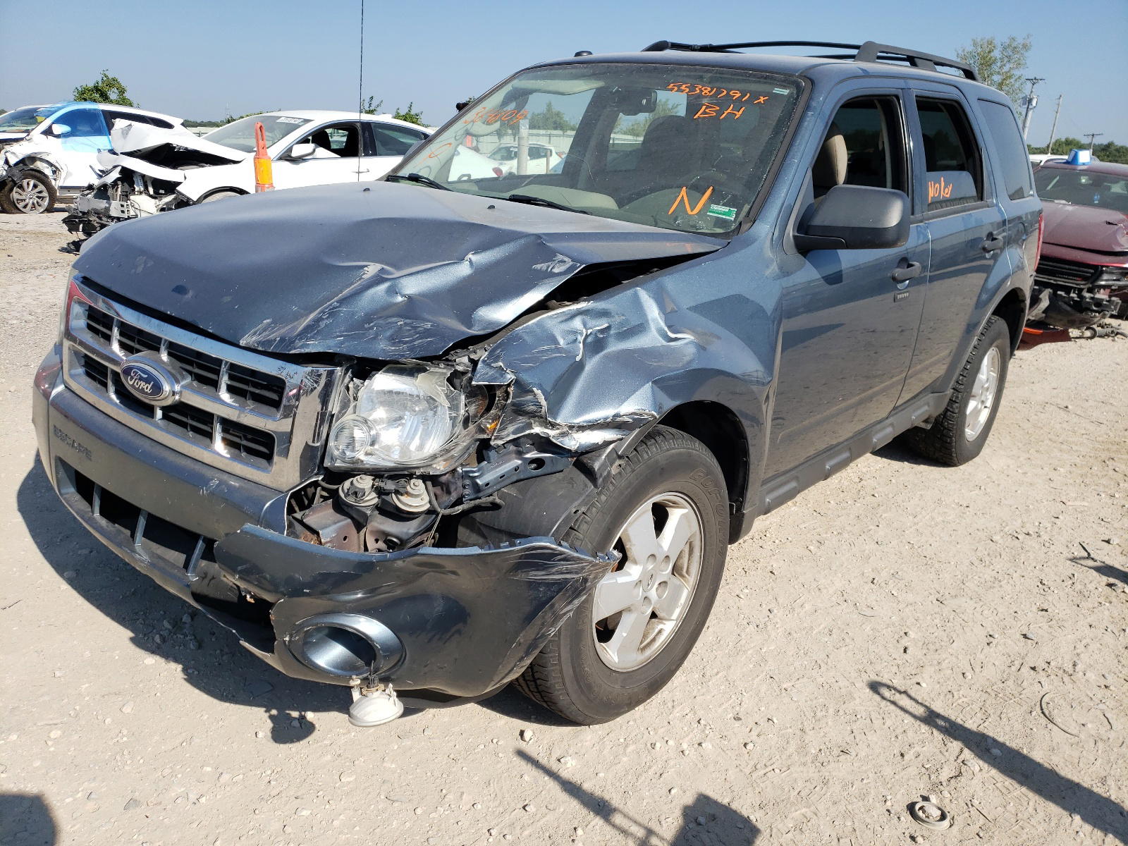 Photo 2 from auction – 2010 FORD ESCAPE XLT with VIN 1FMCU9DG6AKB64609