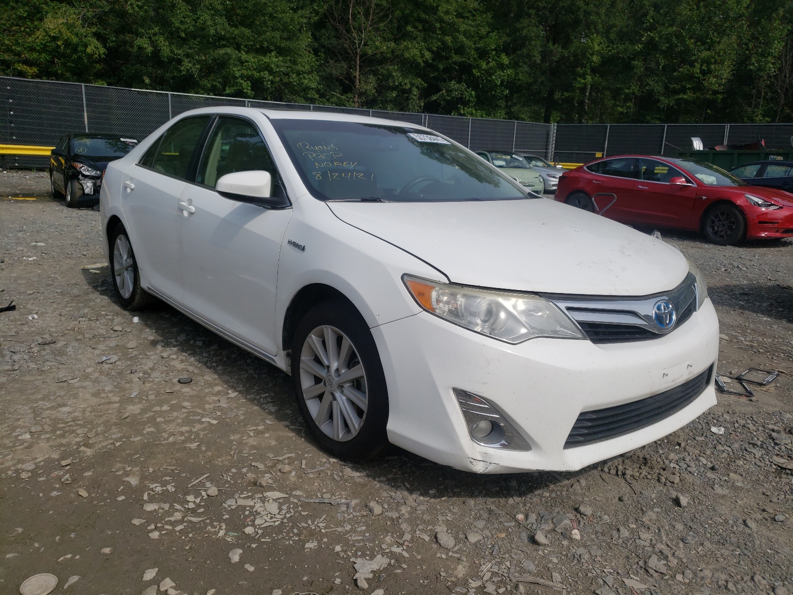 Photo 1 from auction – 2012 TOYOTA CAMRY HYBR with VIN 4T1BD1FK9CU038864
