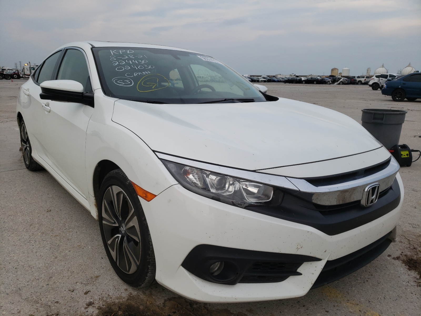 HONDA CIVIC EXL 2018 with VIN JHMFC1F72JX024030 - Photo from auction