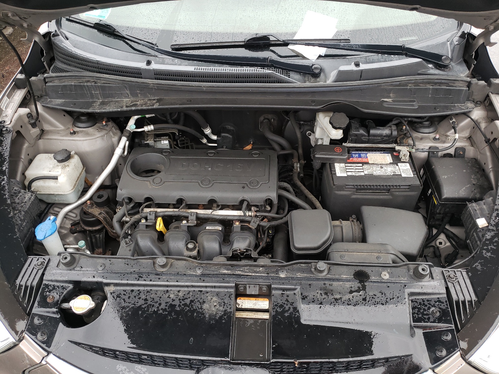 Photo 7 from auction – 2012 HYUNDAI TUCSON GLS with VIN KM8JUCAC0CU543179