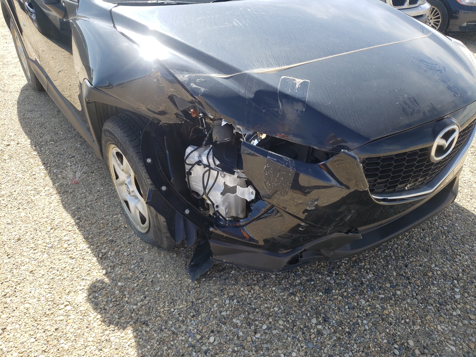 Photo 9 from auction – 2014 MAZDA CX-5 SPORT with VIN JM3KE2BE2E0390273