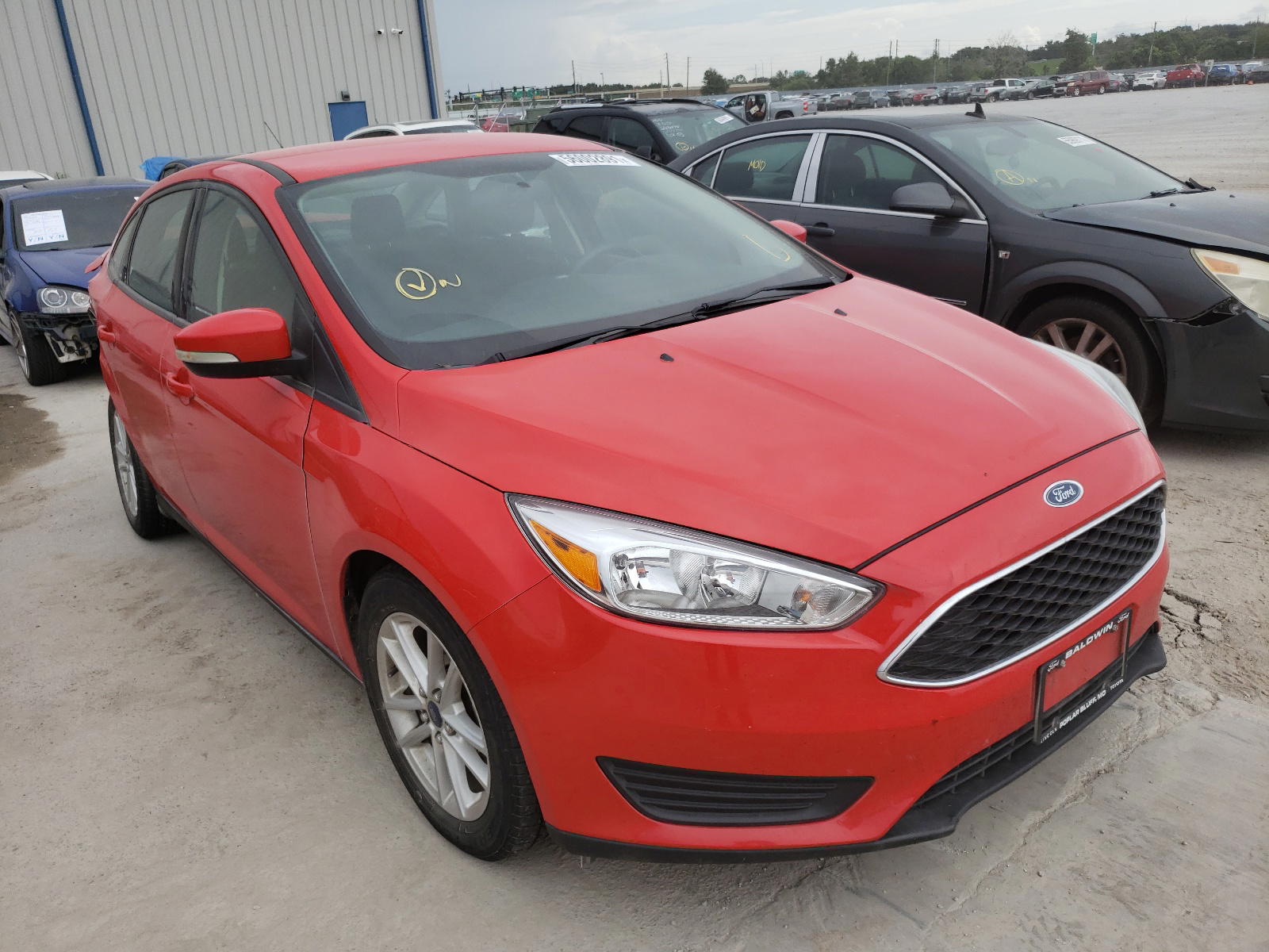FORD FOCUS SE 2015 with VIN 1FADP3F20FL276215 - Photo from auction