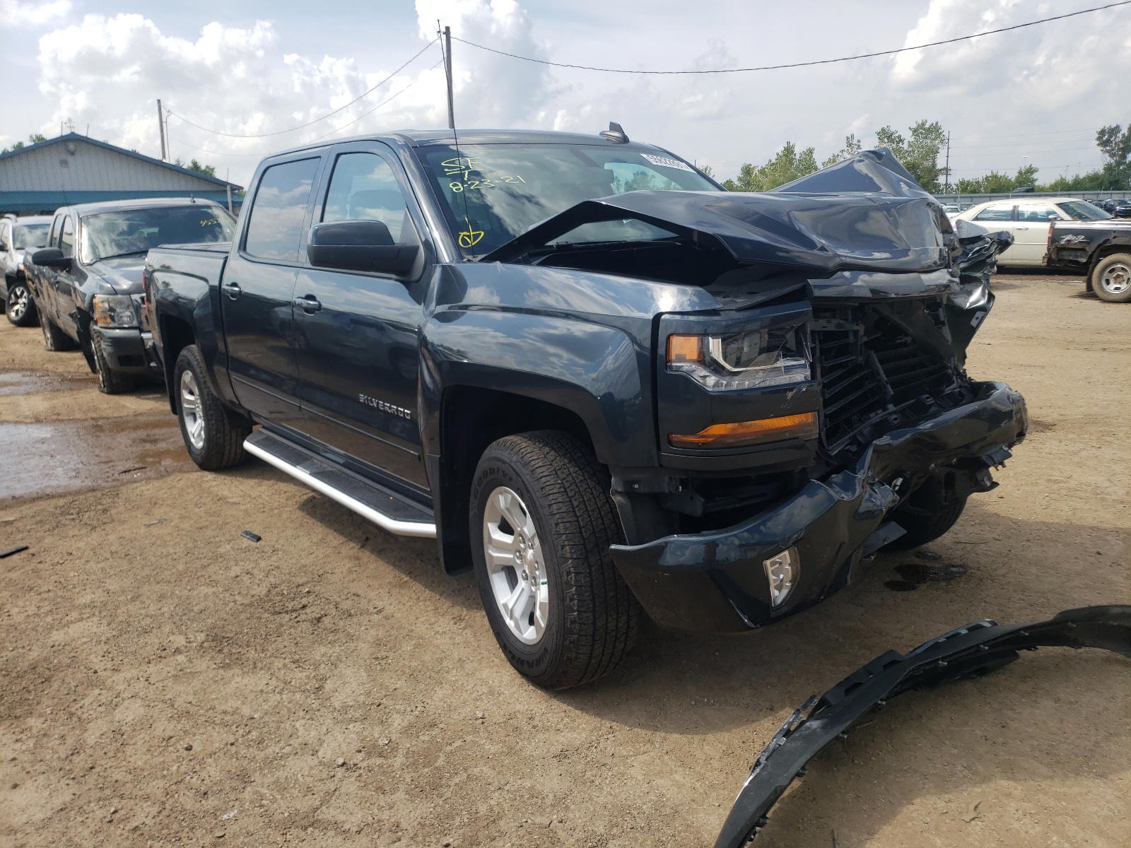 CHEVROLET SILVERADO 2018 with VIN 3GCUKREC8JG474097 - Photo from auction