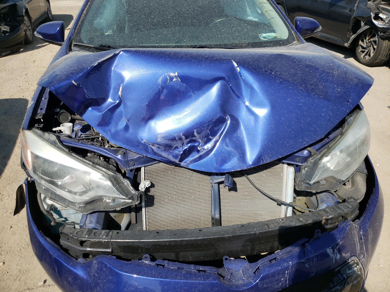 Photo 9 from auction – 2014 TOYOTA COROLLA L with VIN 5YFBURHE9EP164085