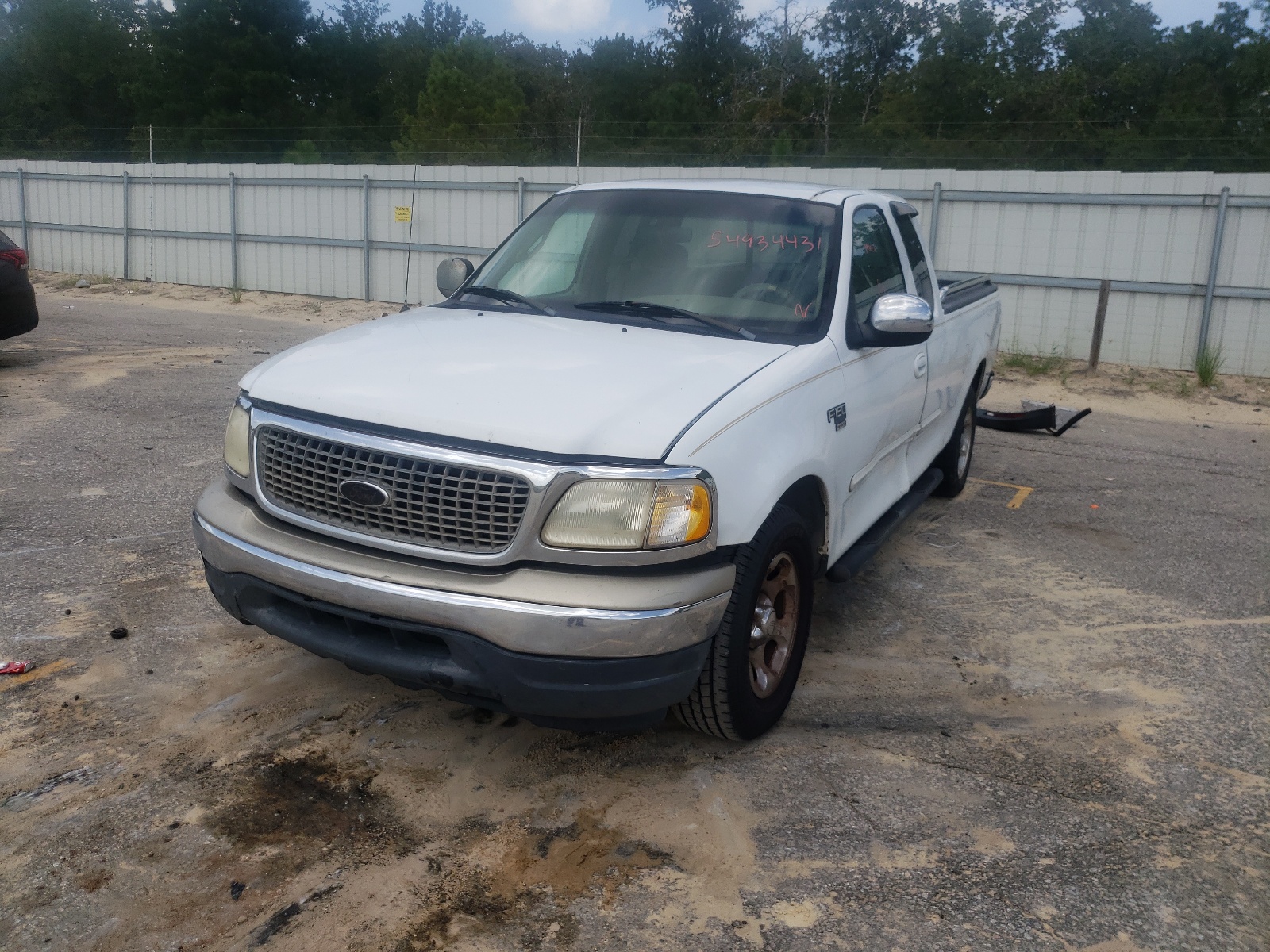 Photo 2 from auction – 2001 FORD F150 with VIN 1FTRX17L31NA58925