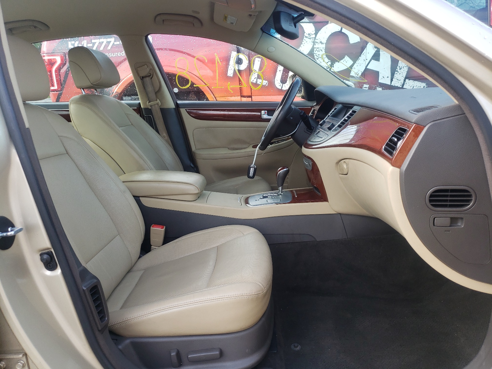 Photo 5 from auction – 2012 HYUNDAI GENESIS 3. with VIN KMHGC4DD5CU181082