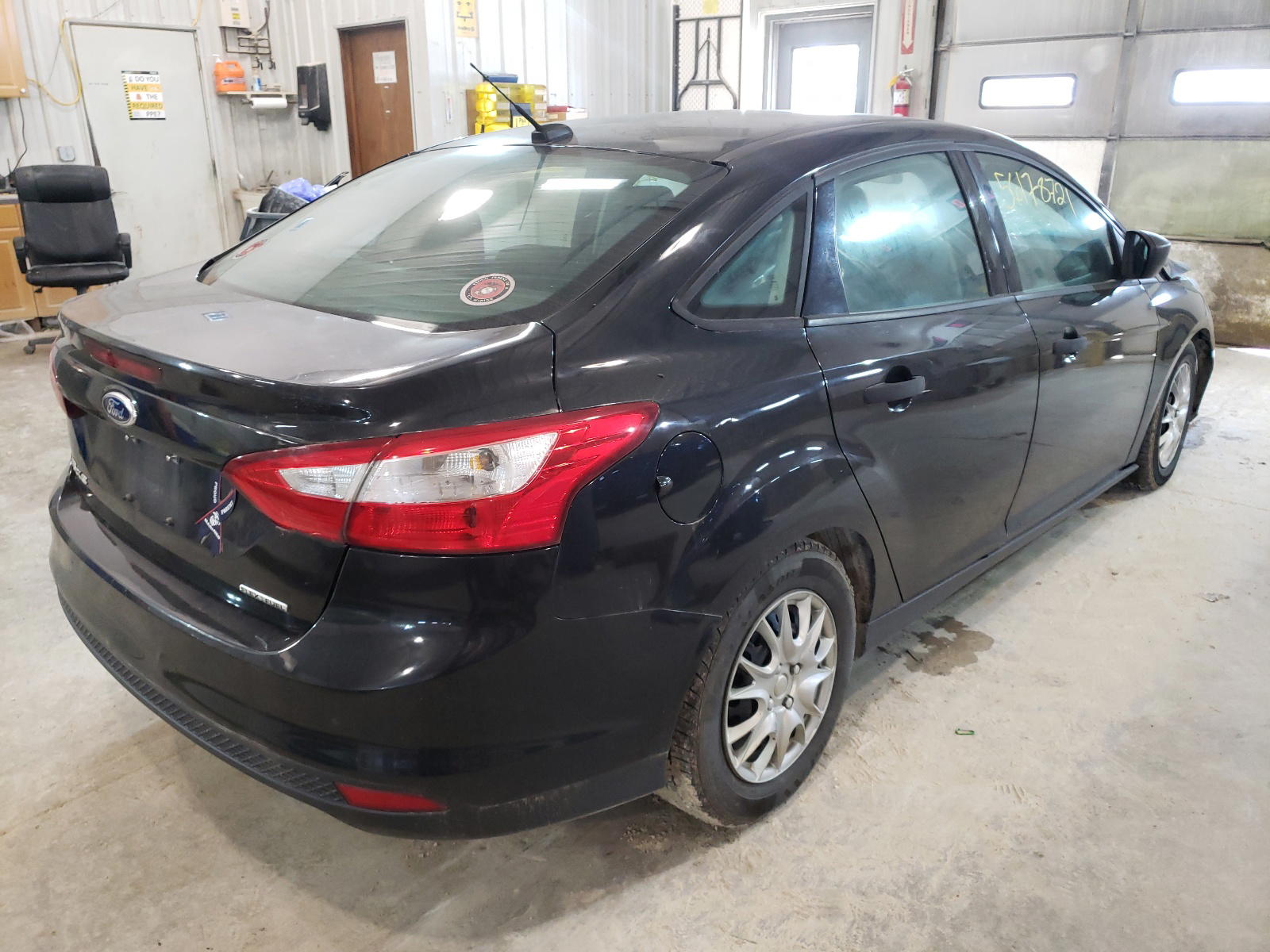 Photo 4 from auction – 2014 FORD FOCUS S with VIN 1FADP3E28EL105082
