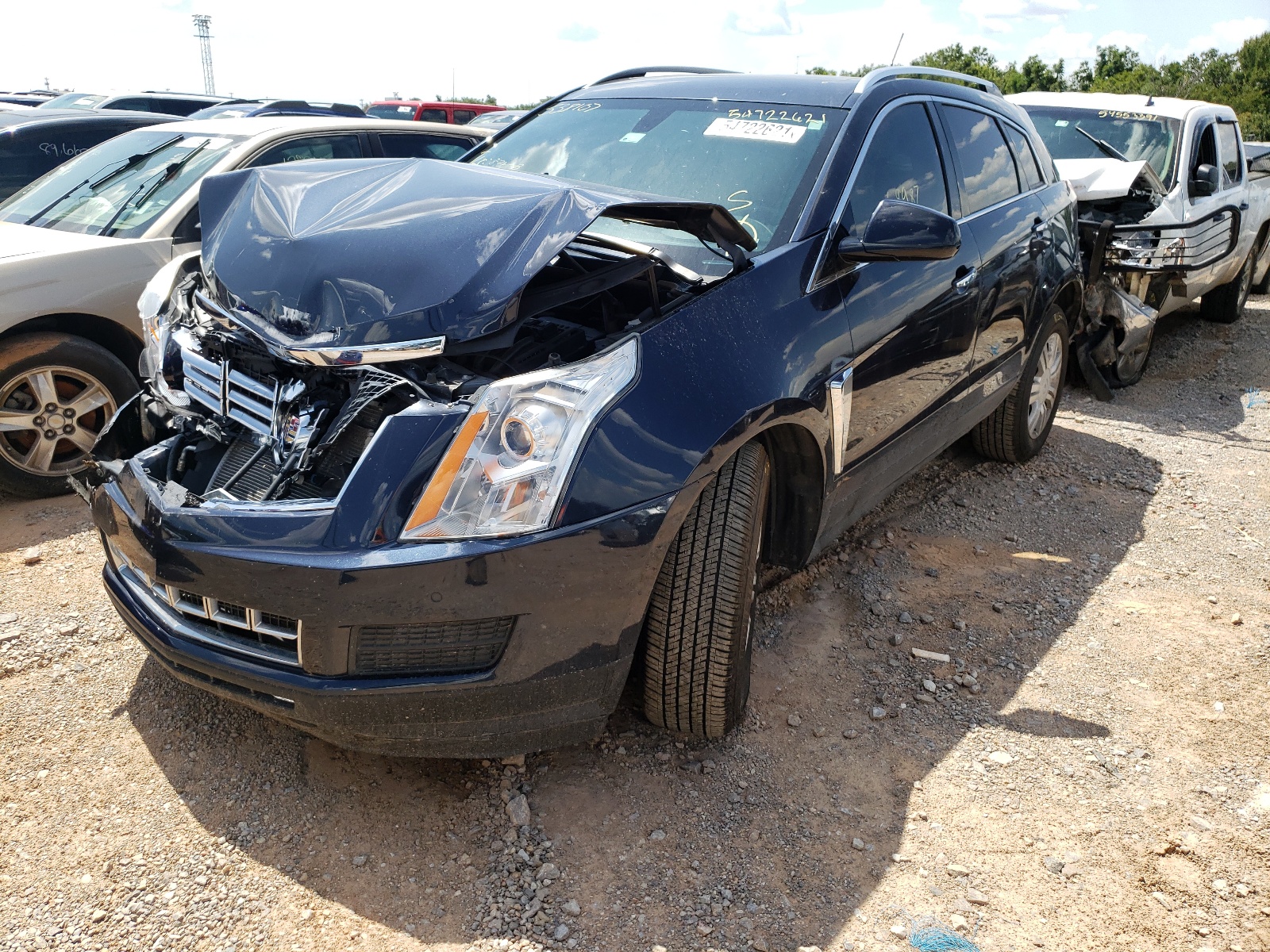 Photo 2 from auction – 2014 CADILLAC SRX LUXURY with VIN 3GYFNEE32ES538107