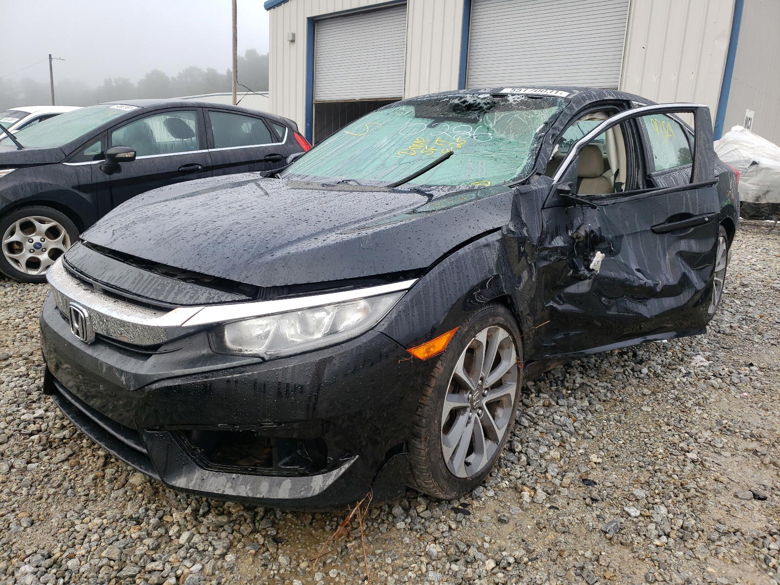 Photo 2 from auction – 2016 HONDA CIVIC LX with VIN 19XFC2E52GE050286