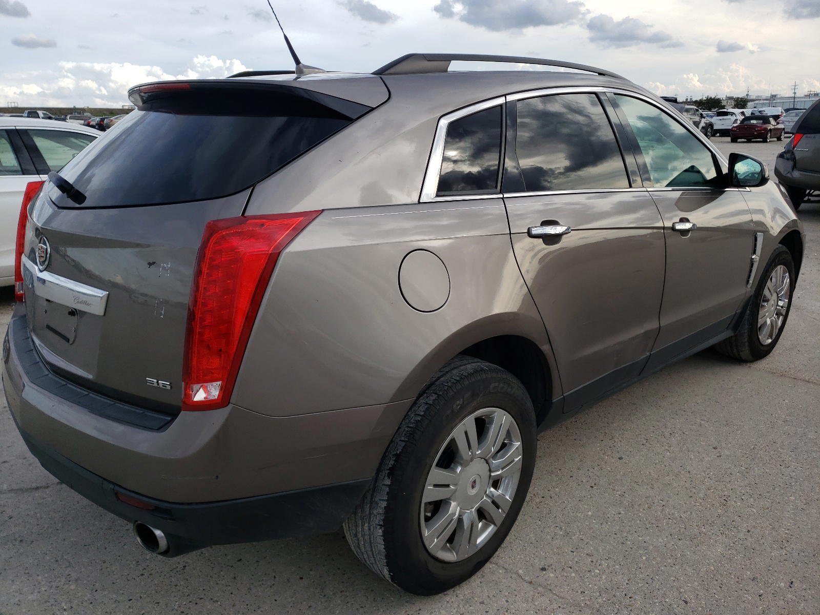 Photo 4 from auction – 2012 CADILLAC SRX with VIN 3GYFNGE34CS572266