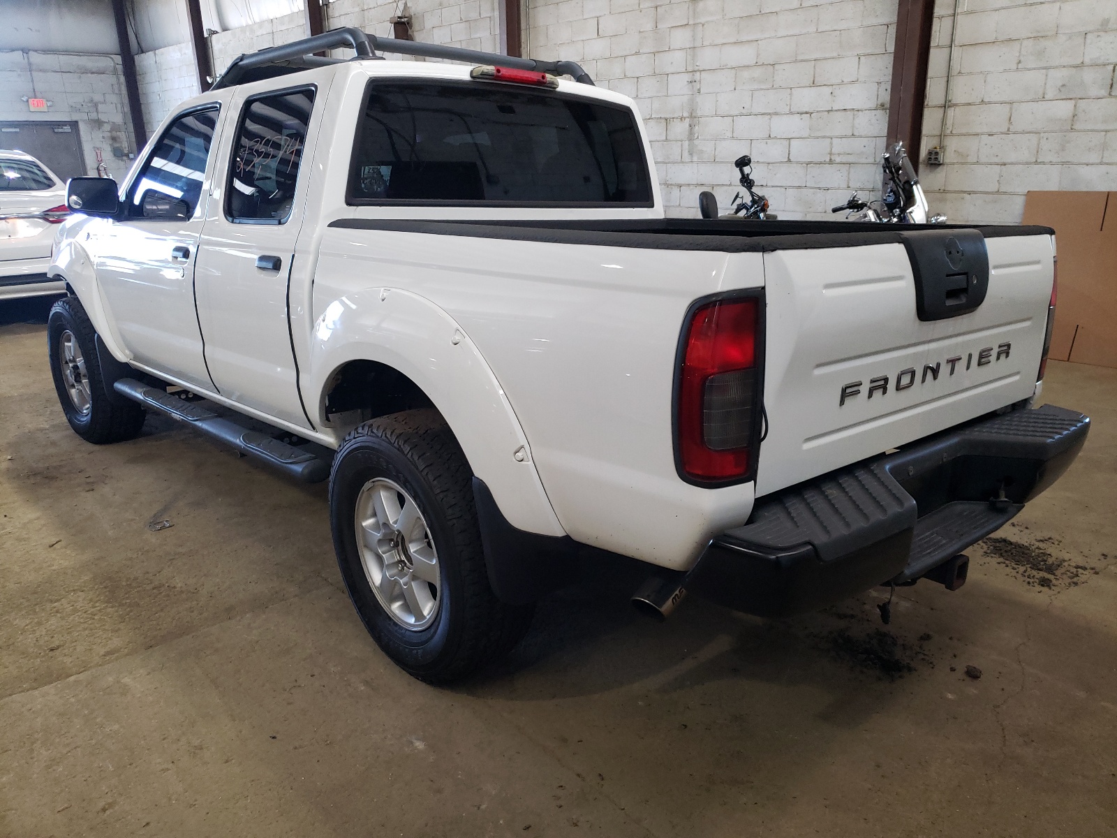 Photo 3 from auction – 2003 NISSAN FRONTIER C with VIN 1N6MD27YX3C400080