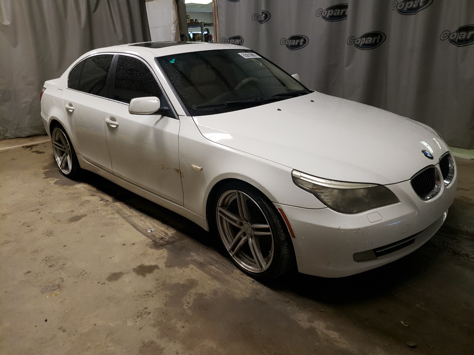 BMW 528 I 2008 with VIN WBANU535X8C113833 - Photo from auction