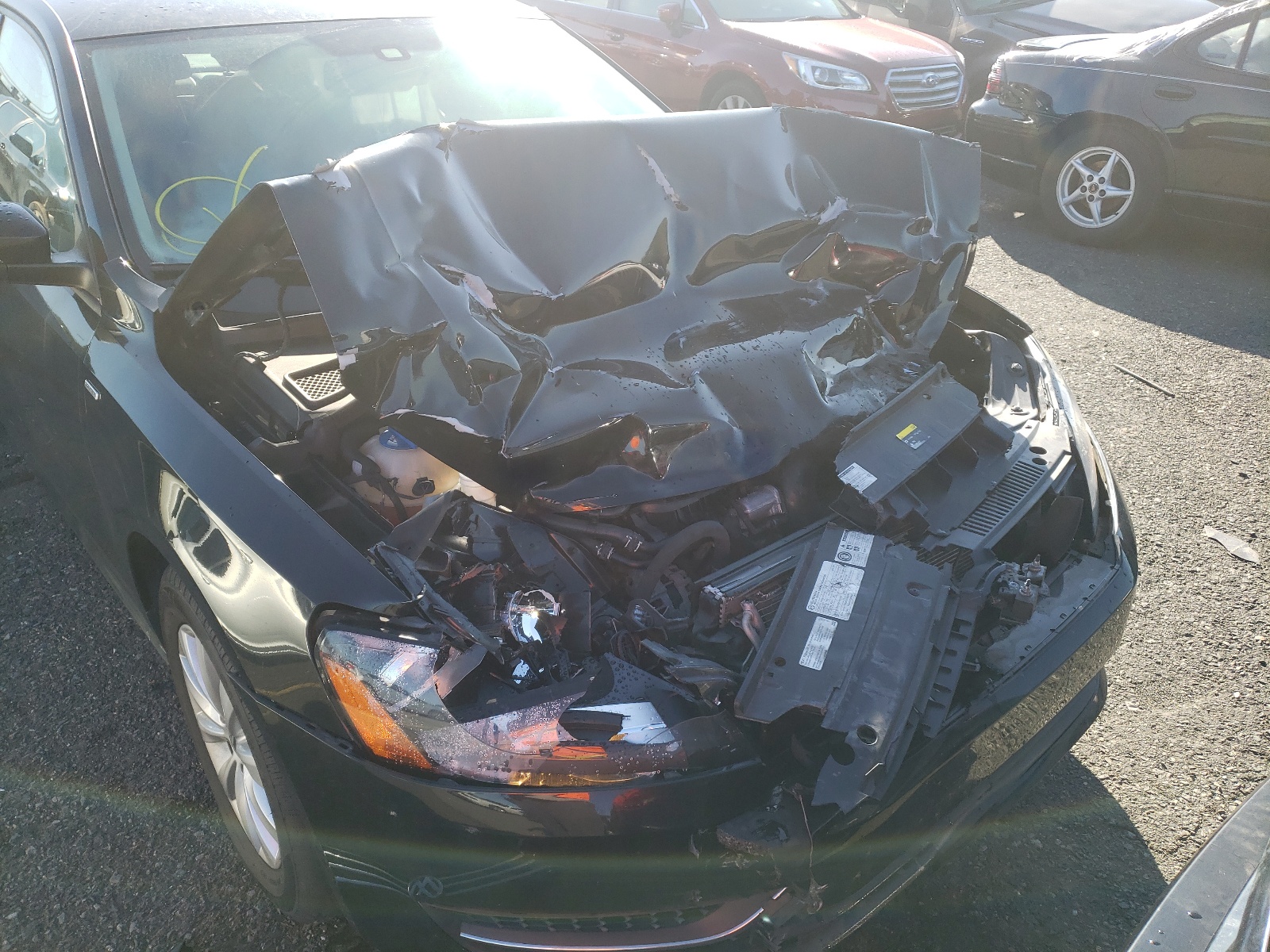 Photo 9 from auction – 2015 VOLKSWAGEN PASSAT S with VIN 1VWAT7A38FC068662