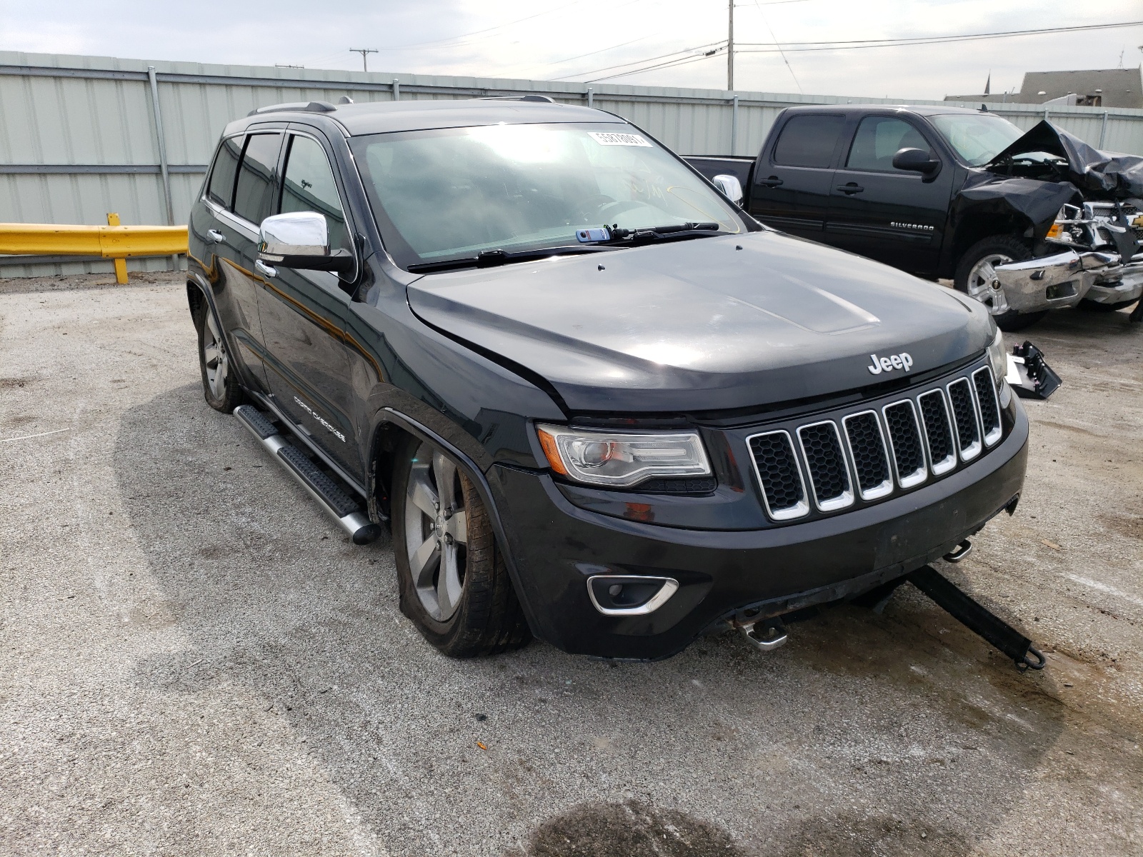 JEEP GRAND CHER 2014 with VIN 1C4RJFCGXEC122273 - Photo from auction