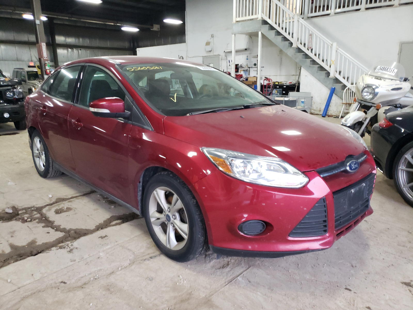 FORD FOCUS SE 2014 with VIN 1FADP3F24EL419410 - Photo from auction