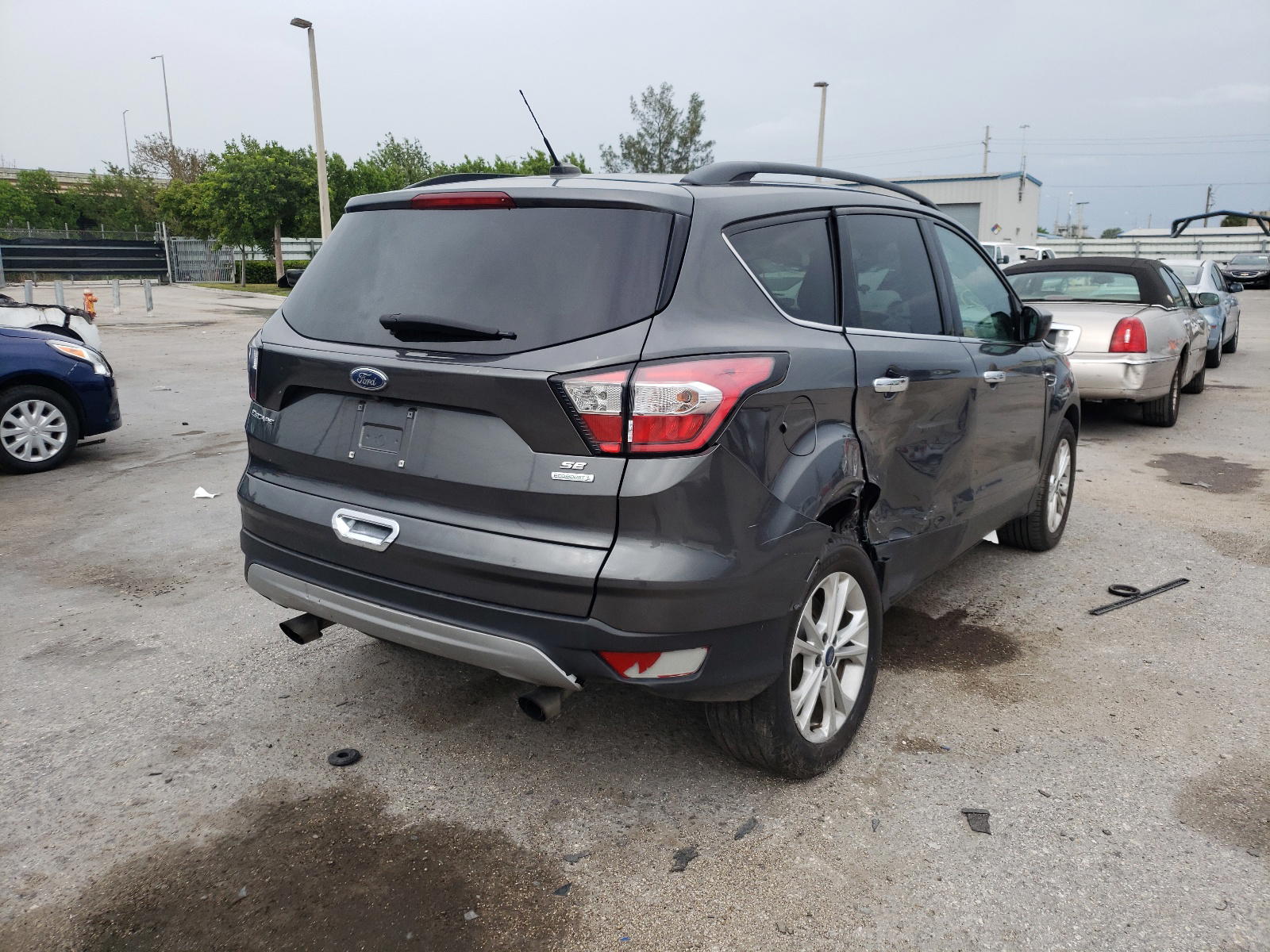 Photo 4 from auction – 2018 FORD ESCAPE SE with VIN 1FMCU0GD5JUB61797