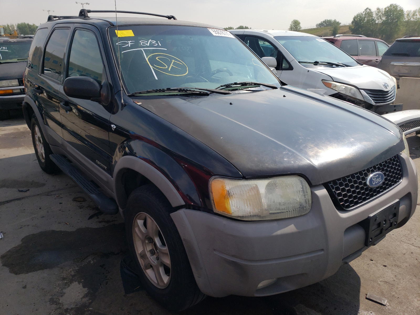 FORD ESCAPE XLT 2001 with VIN 1FMCU04111KA80365 - Photo from auction