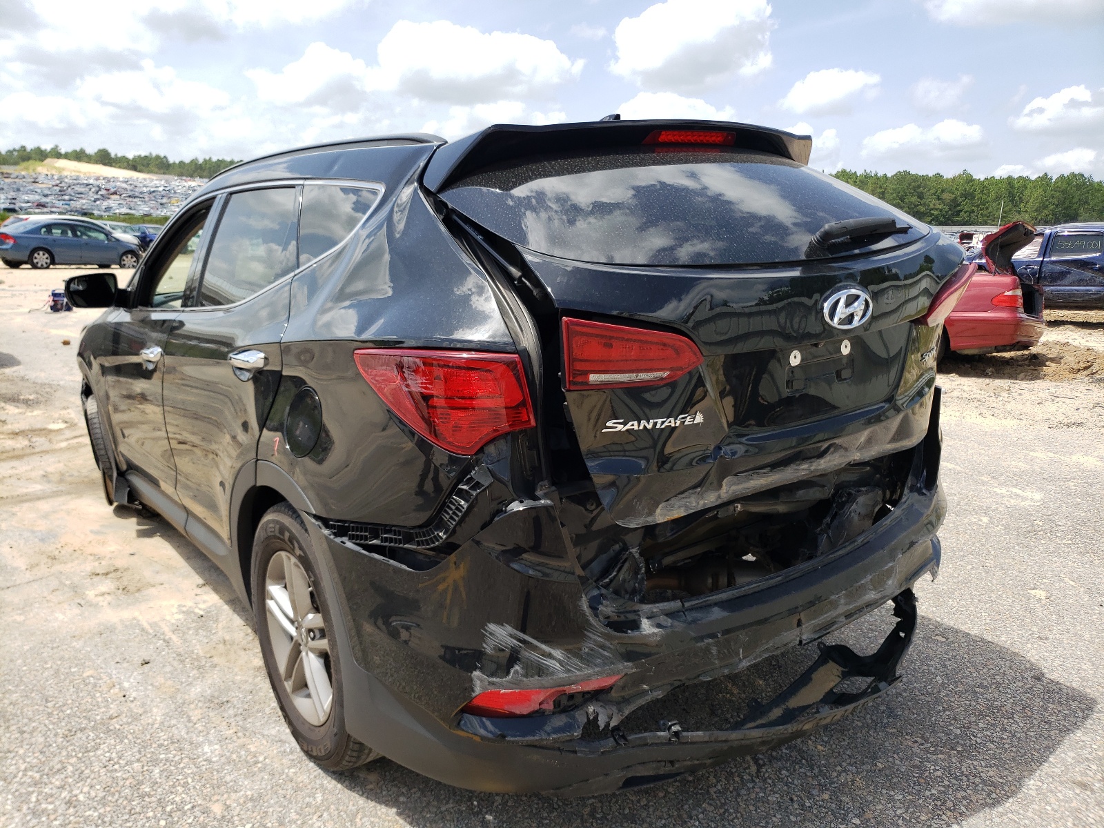 Photo 3 from auction – 2017 HYUNDAI SANTA FE S with VIN 5NMZU3LBXHH031956