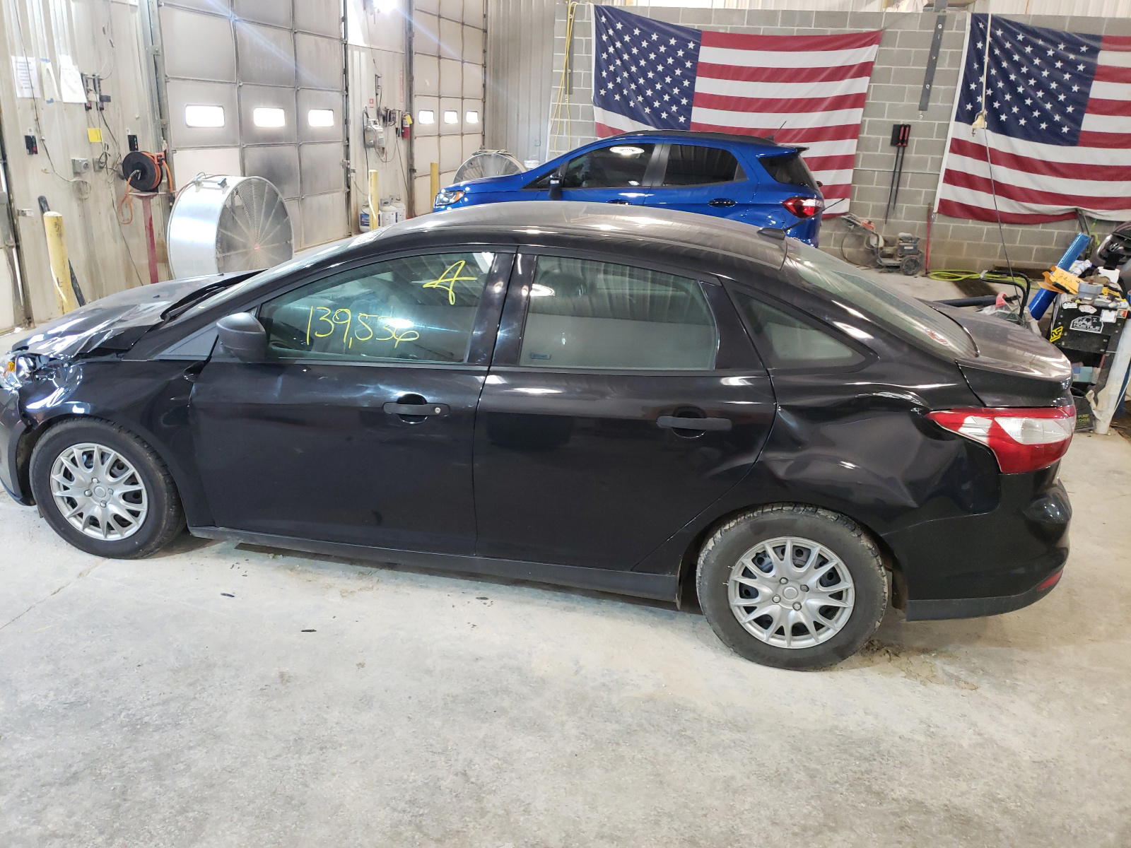 Photo 9 from auction – 2014 FORD FOCUS S with VIN 1FADP3E28EL105082