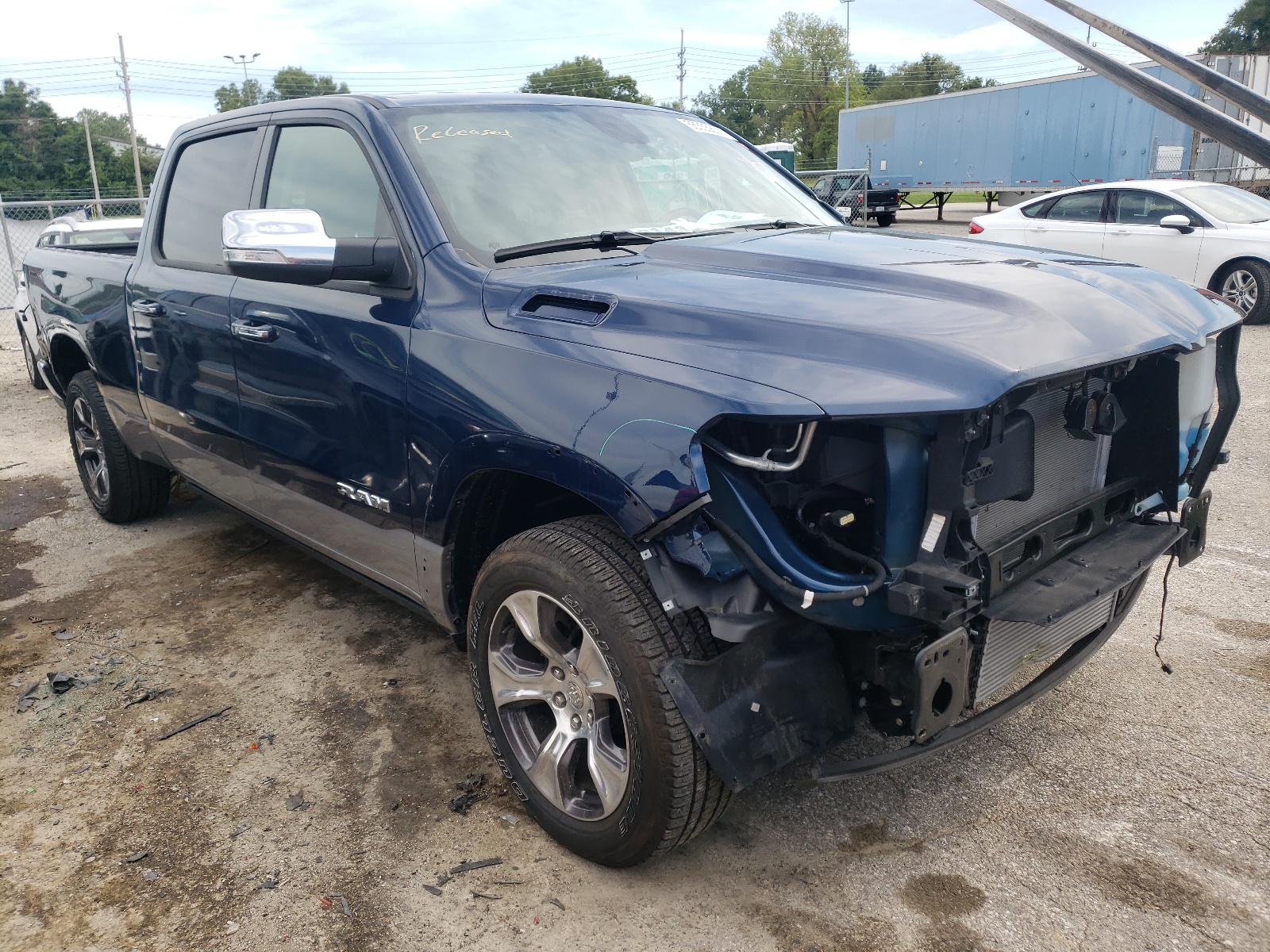 RAM 1500 LARAM 2020 with VIN 1C6SRFRM8LN258465 - Photo from auction