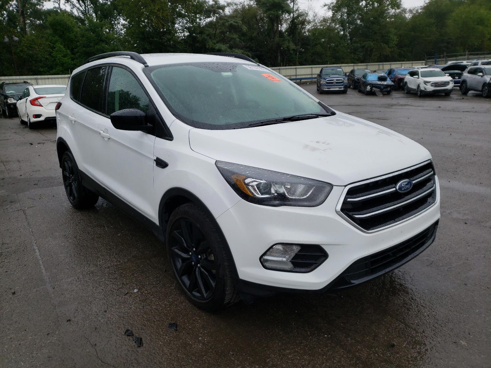 FORD ESCAPE SE 2019 with VIN 1FMCU9GD2KUB76103 - Photo from auction