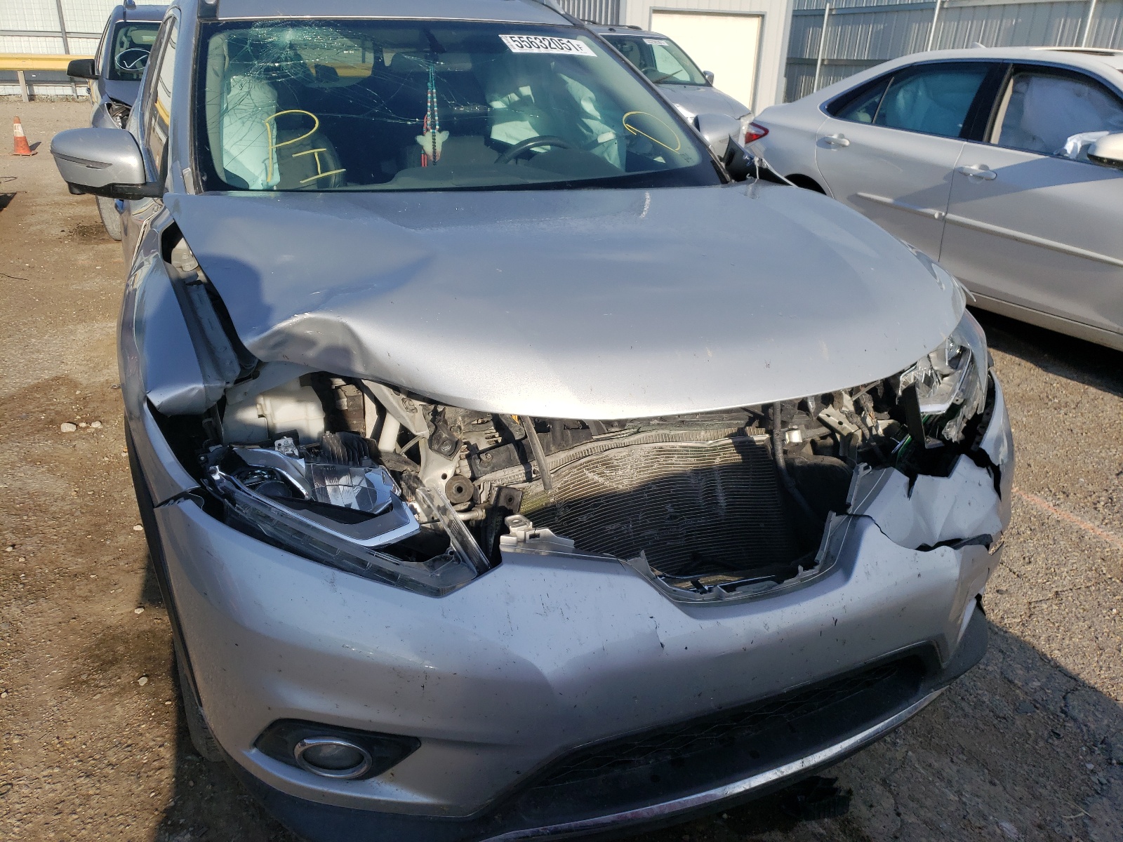 Photo 9 from auction – 2014 NISSAN ROGUE S with VIN 5N1AT2MV9EC867640