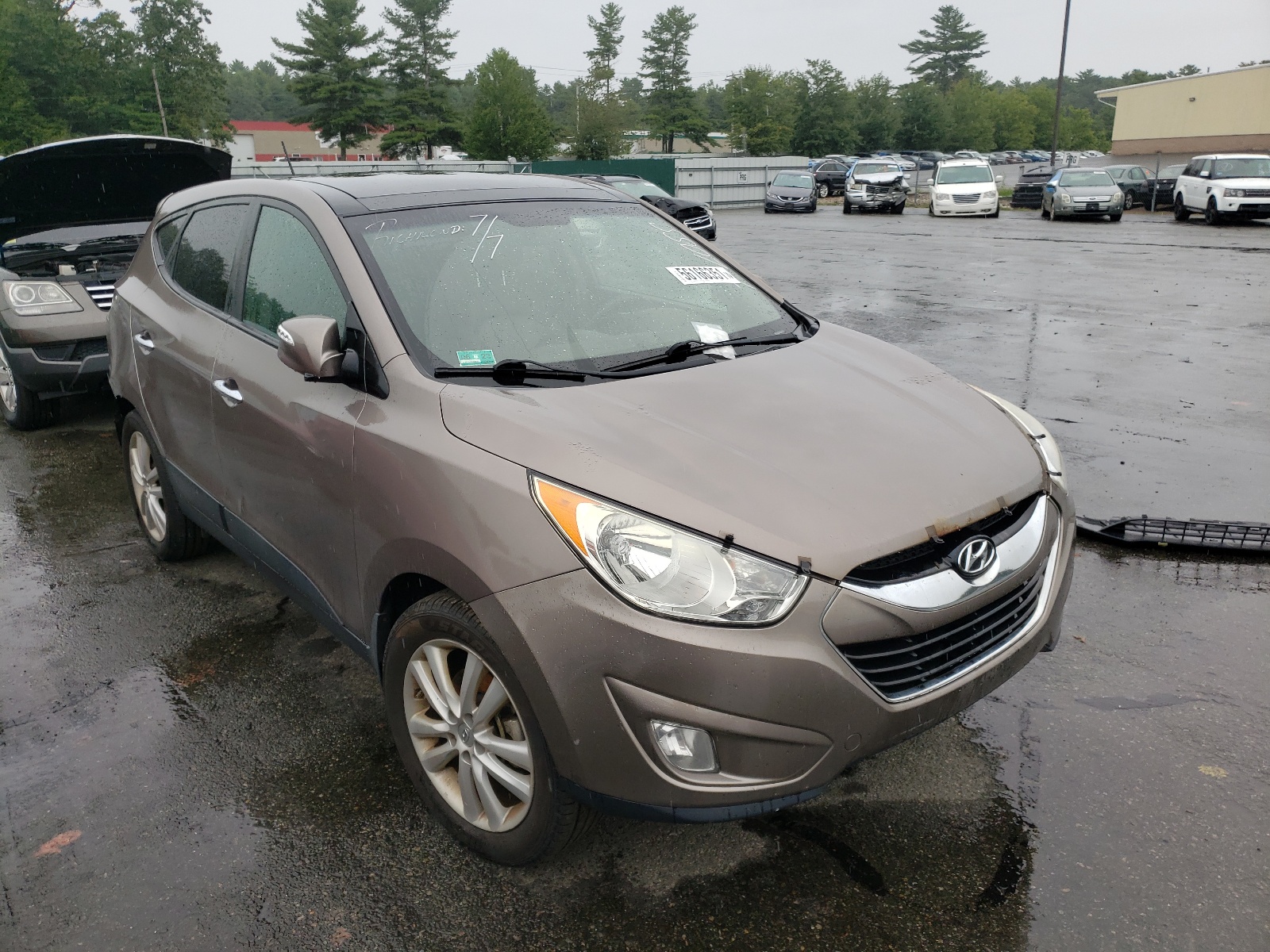 Photo 1 from auction – 2012 HYUNDAI TUCSON GLS with VIN KM8JUCAC0CU543179