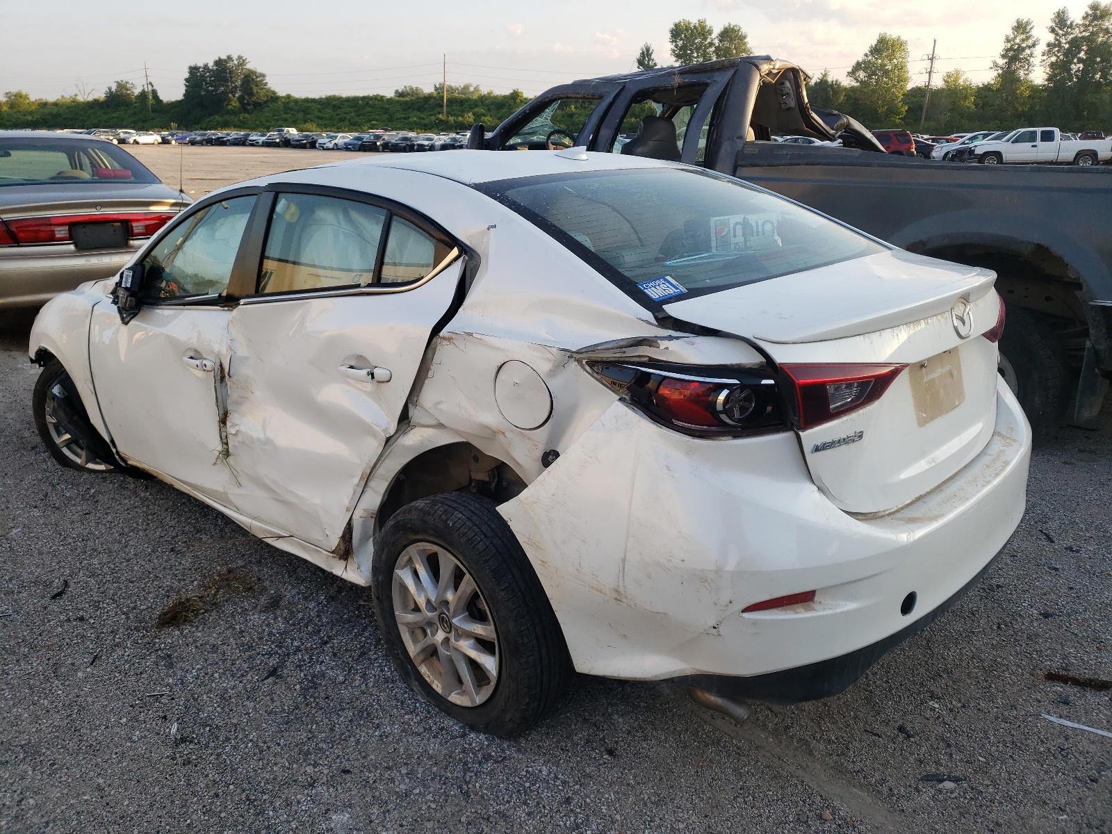 Photo 3 from auction – 2014 MAZDA 3 TOURING with VIN JM1BM1V79E1108126