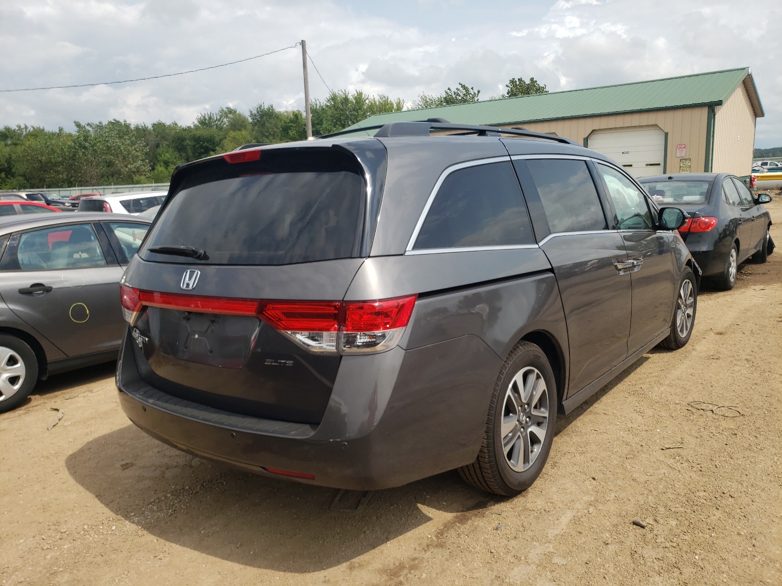 Photo 4 from auction – 2015 HONDA ODYSSEY TO with VIN 5FNRL5H90FB097015