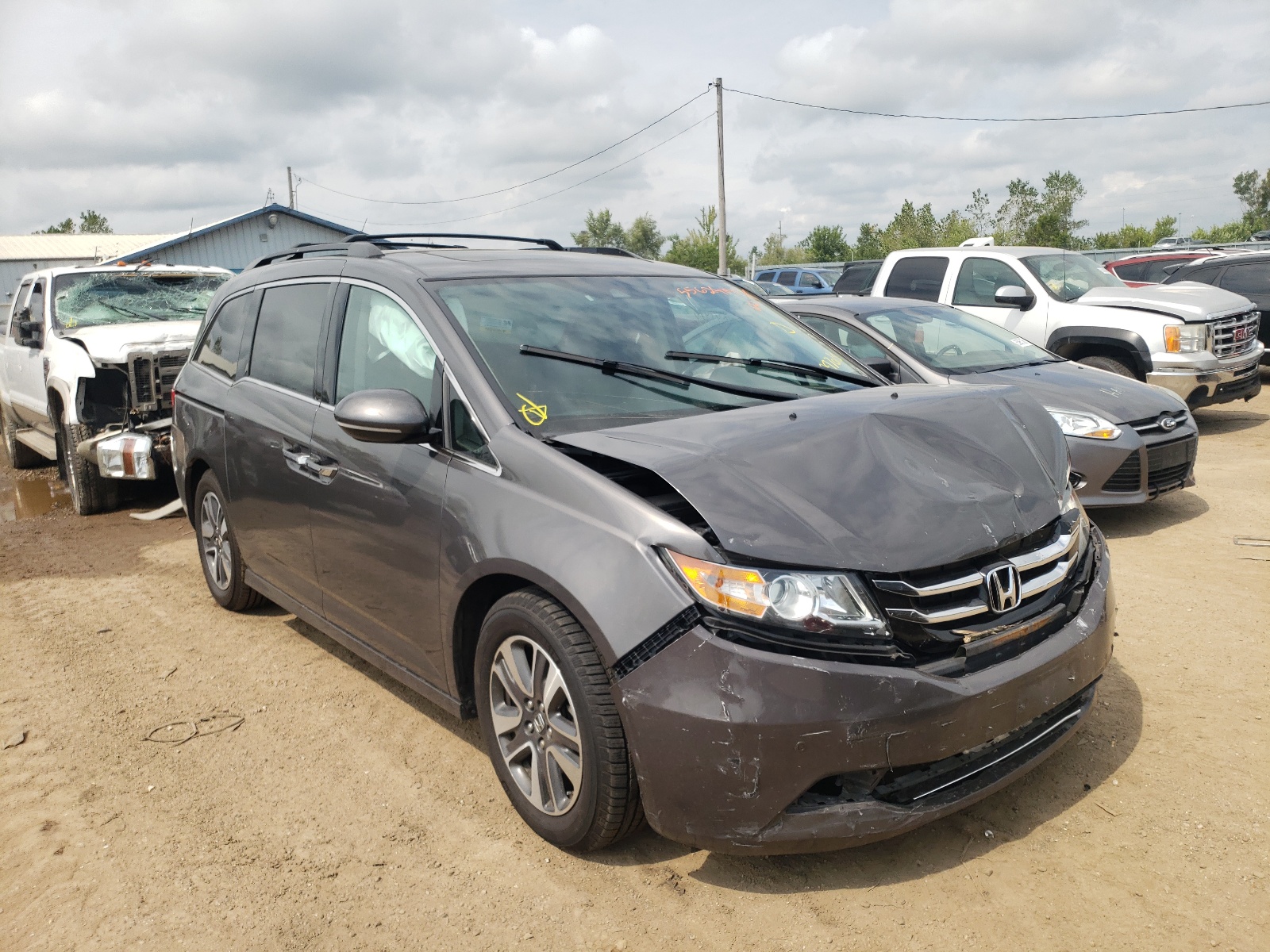 HONDA ODYSSEY TO 2015 with VIN 5FNRL5H90FB097015 - Photo from auction