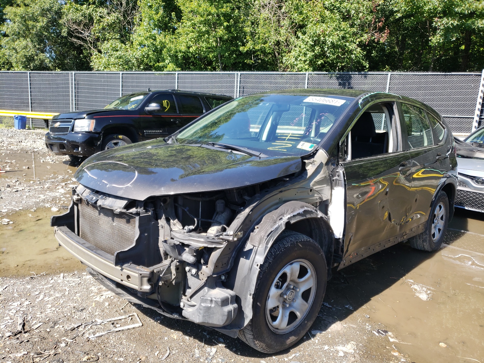 Photo 2 from auction – 2014 HONDA CR-V LX with VIN 5J6RM4H35EL012985