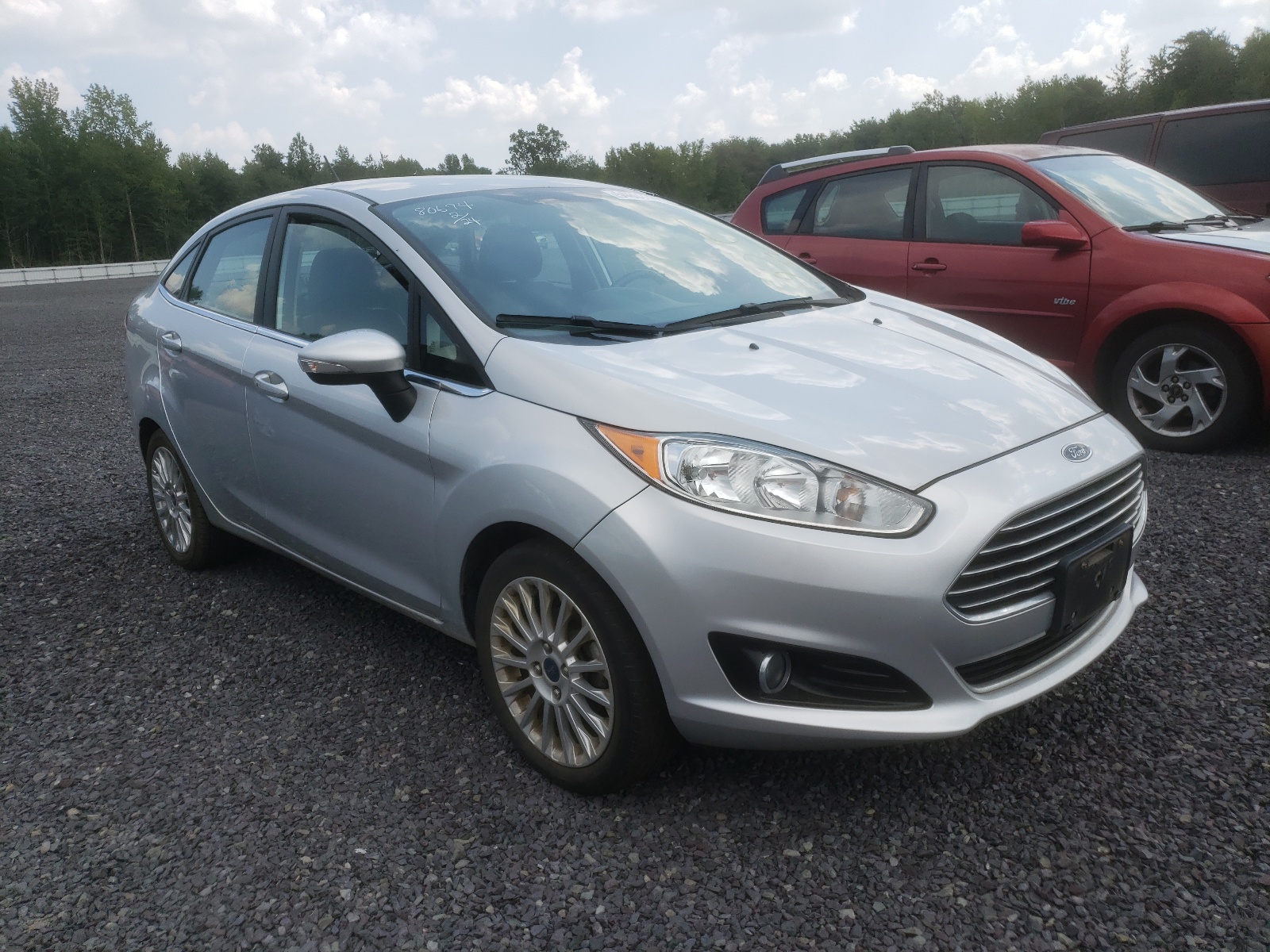 Photo 1 from auction – 2014 FORD FIESTA TIT with VIN 3FADP4CJ2EM204088