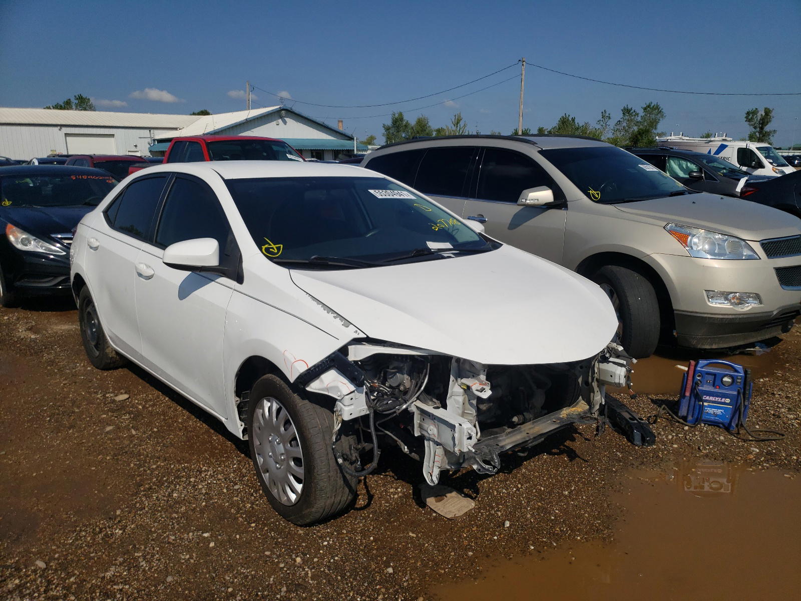 TOYOTA COROLLA L 2015 with VIN 5YFBURHE3FP207708 - Photo from auction