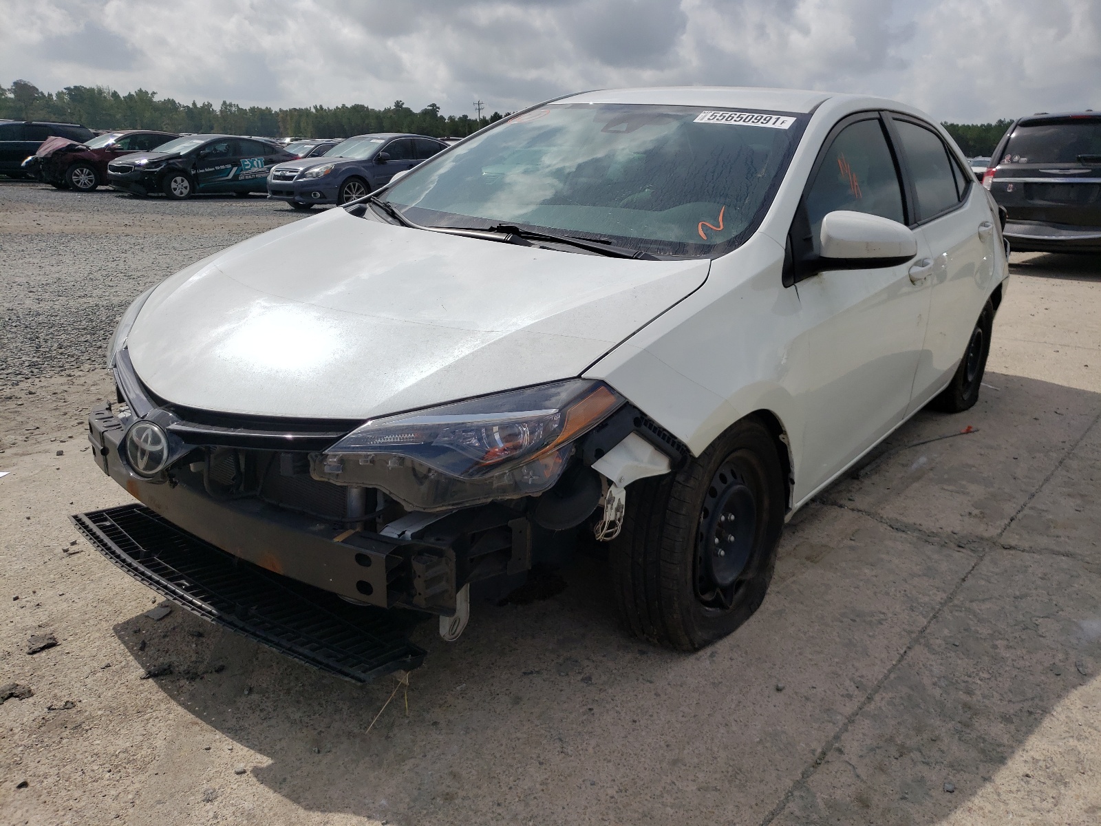 Photo 2 from auction – 2017 TOYOTA COROLLA L with VIN 5YFBURHE5HP648064