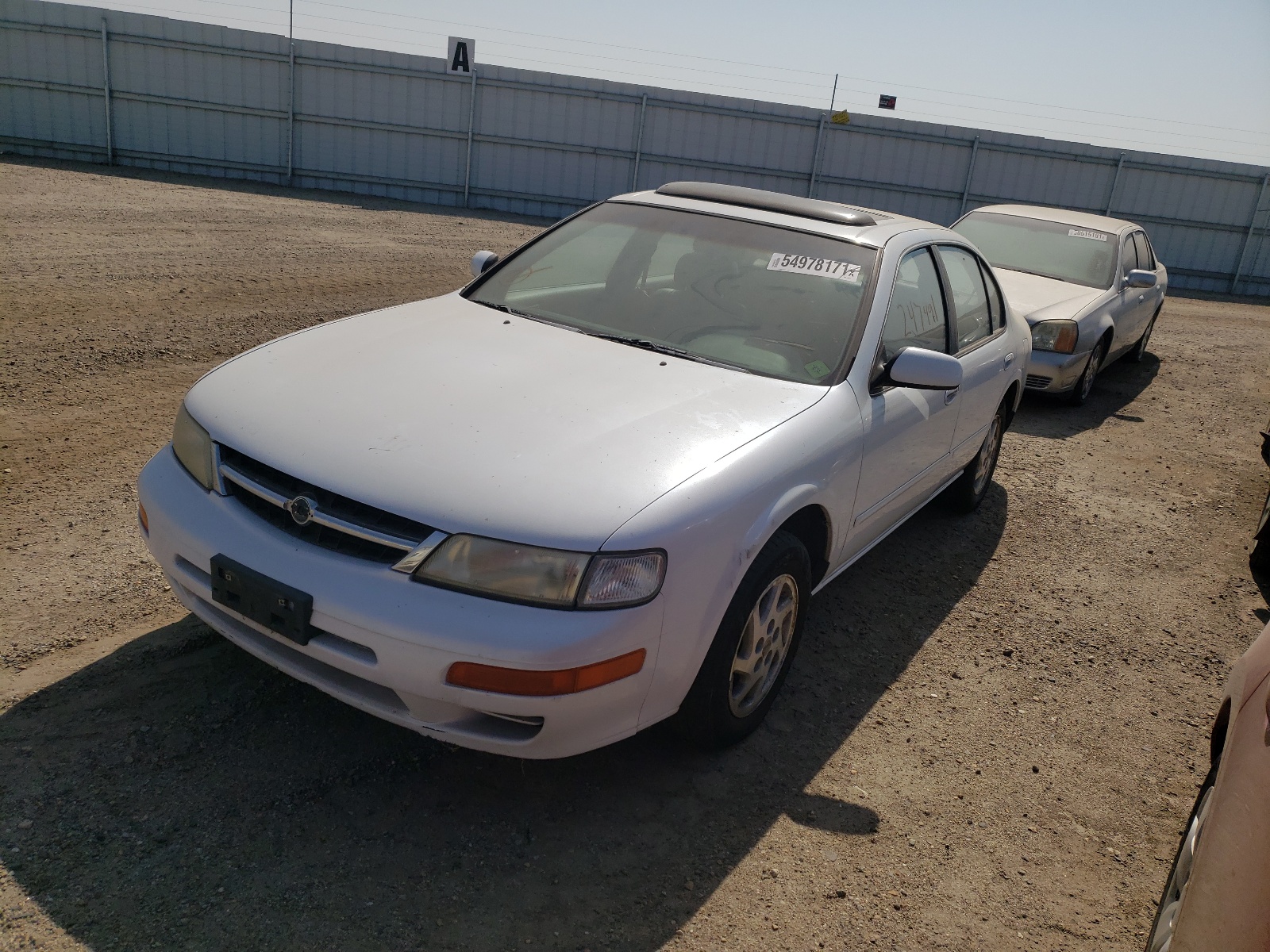 Photo 2 from auction – 1997 NISSAN MAXIMA GLE with VIN JN1CA21D0VT808073