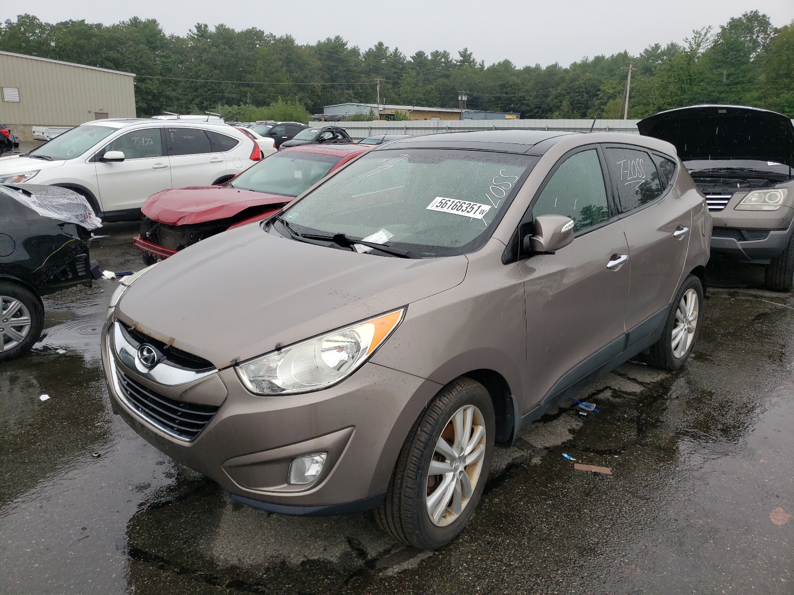 Photo 2 from auction – 2012 HYUNDAI TUCSON GLS with VIN KM8JUCAC0CU543179