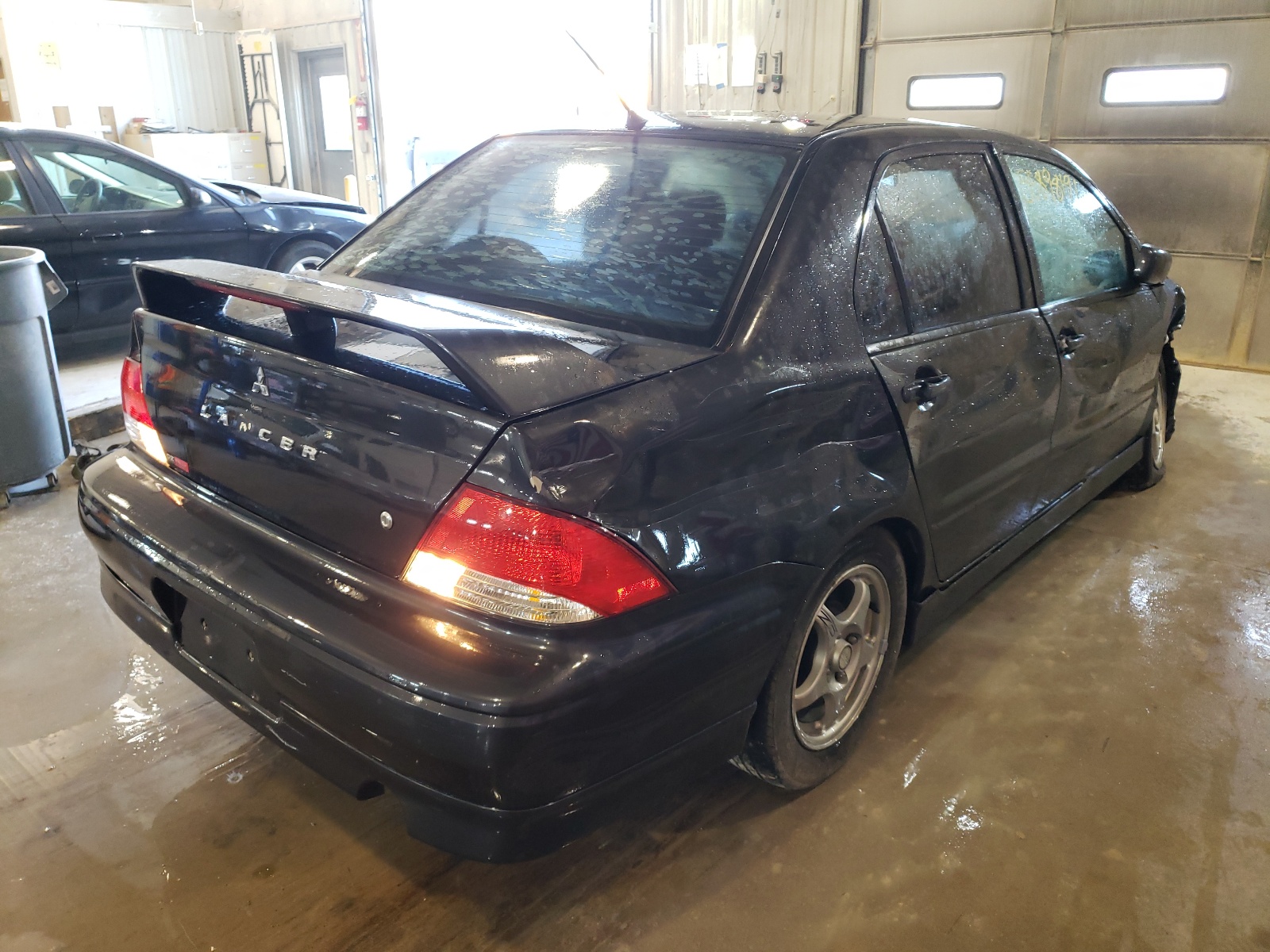 Photo 4 from auction – 2003 MITSUBISHI LANCER OZ with VIN JA3AJ86E43U013994