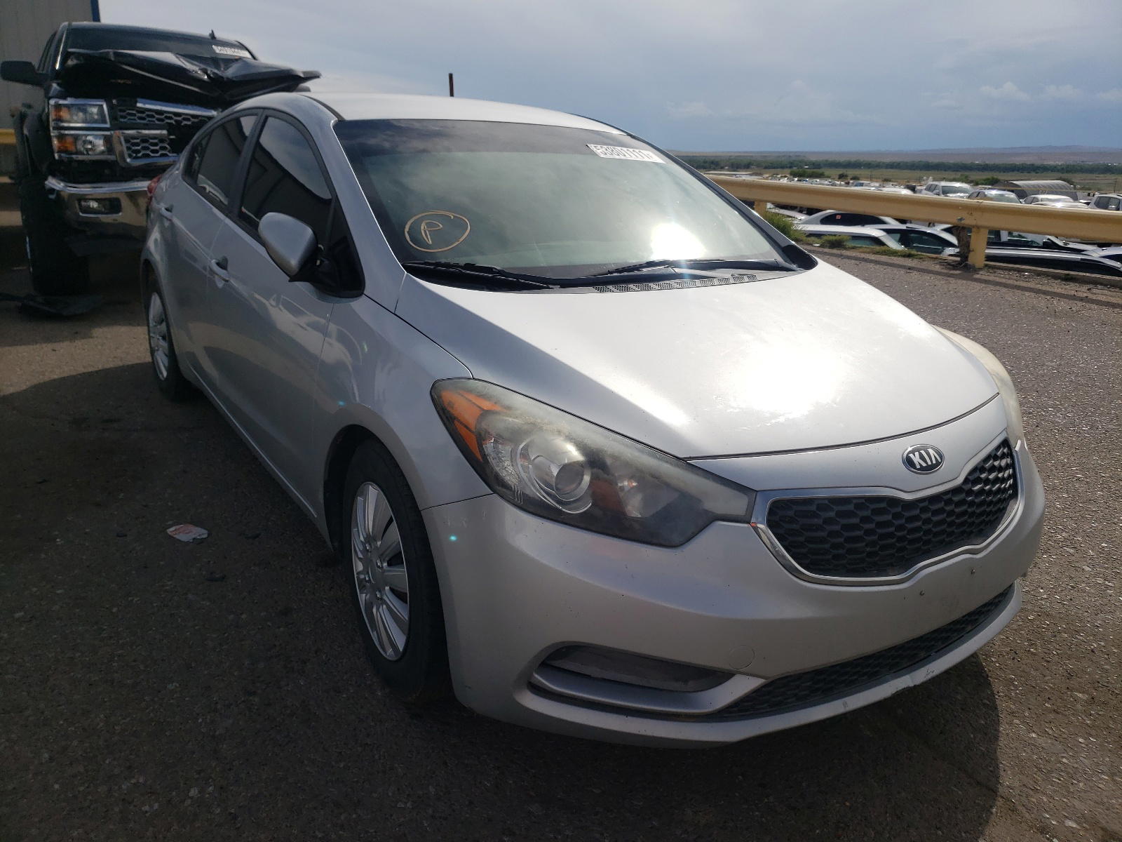 KIA FORTE LX 2015 with VIN KNAFX4A60F5426229 - Photo from auction