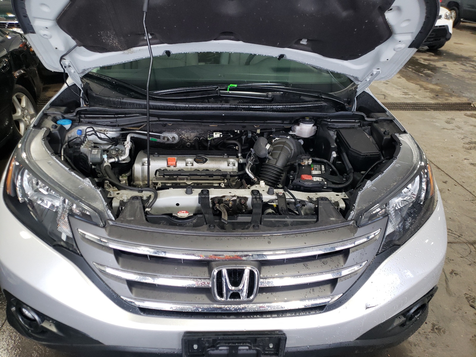 Photo 7 from auction – 2014 HONDA CR-V EXL with VIN 2HKRM4H76EH618325