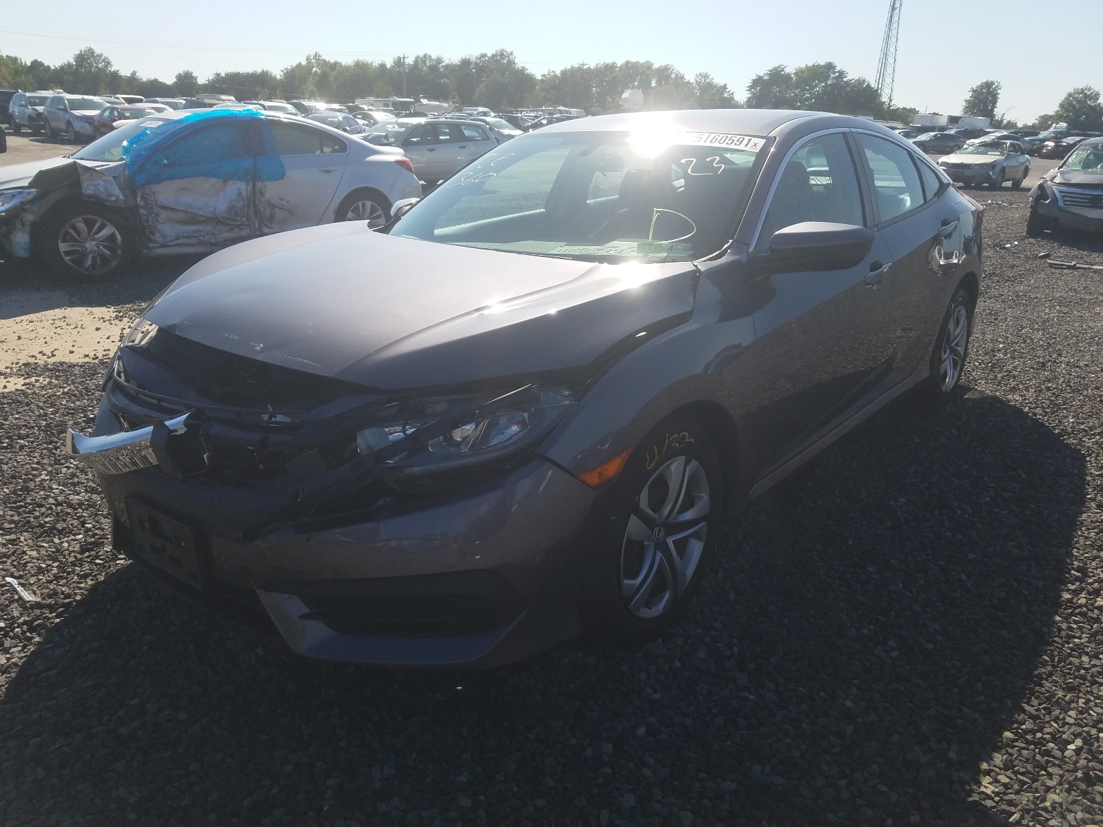 Photo 2 from auction – 2016 HONDA CIVIC LX with VIN 19XFC2F51GE057115