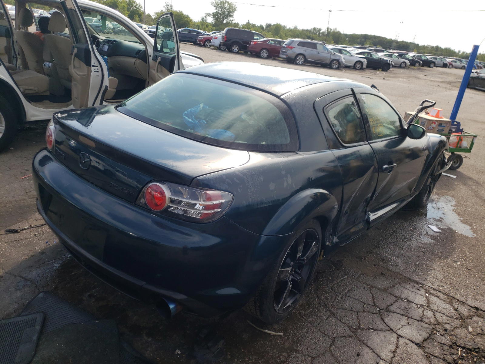 Photo 4 from auction – 2004 MAZDA RX8 with VIN JM1FE17NX40127847