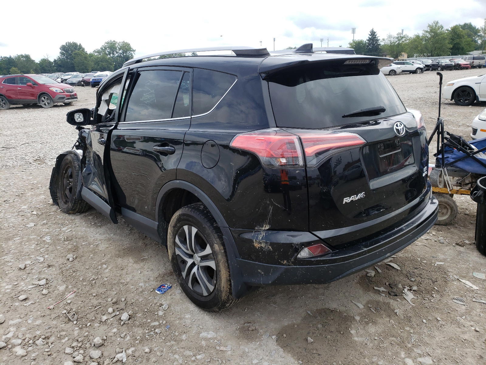 Photo 3 from auction – 2016 TOYOTA RAV4 LE with VIN 2T3BFREV7GW474081
