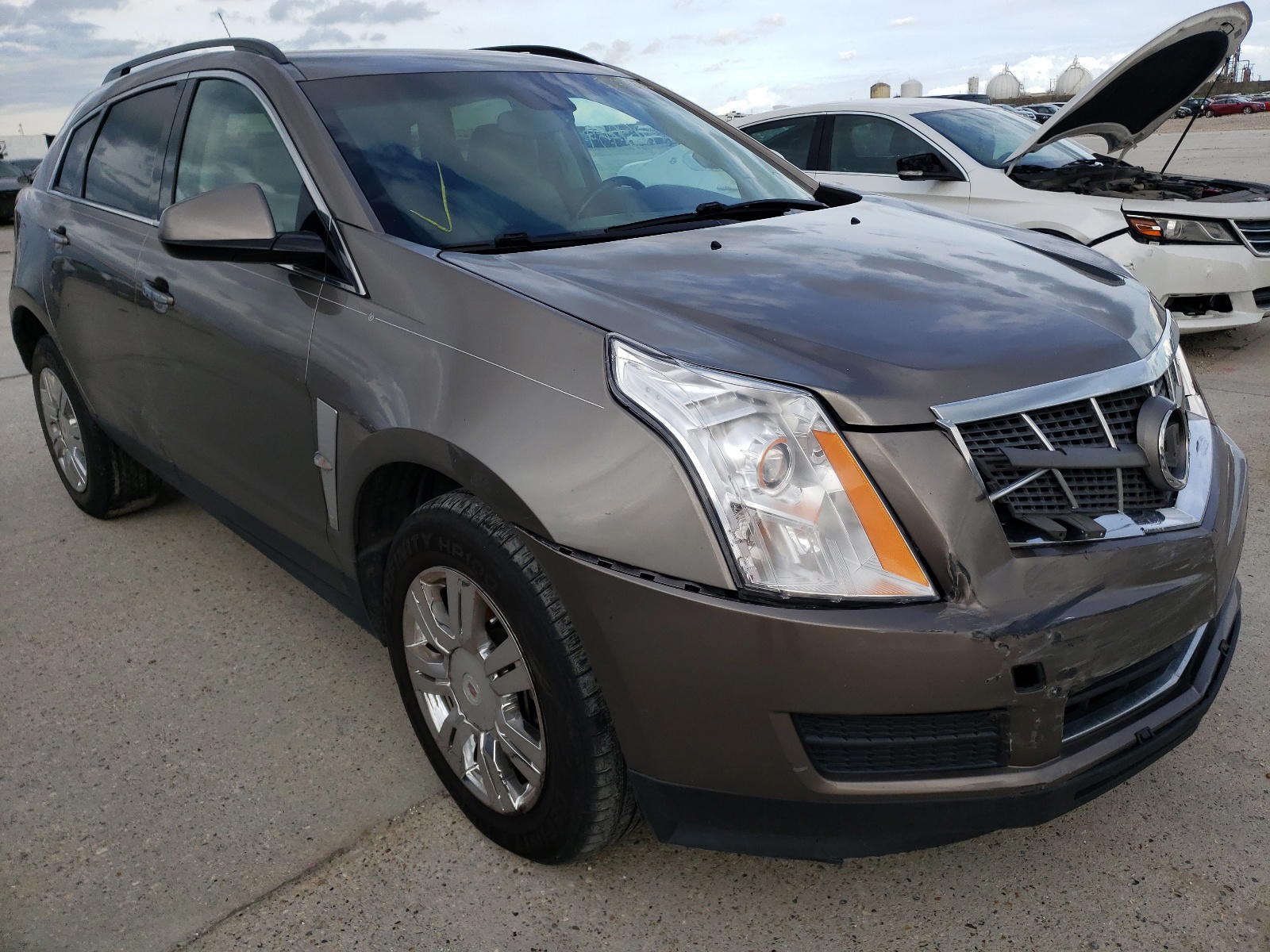 CADILLAC SRX 2012 with VIN 3GYFNGE34CS572266 - Photo from auction